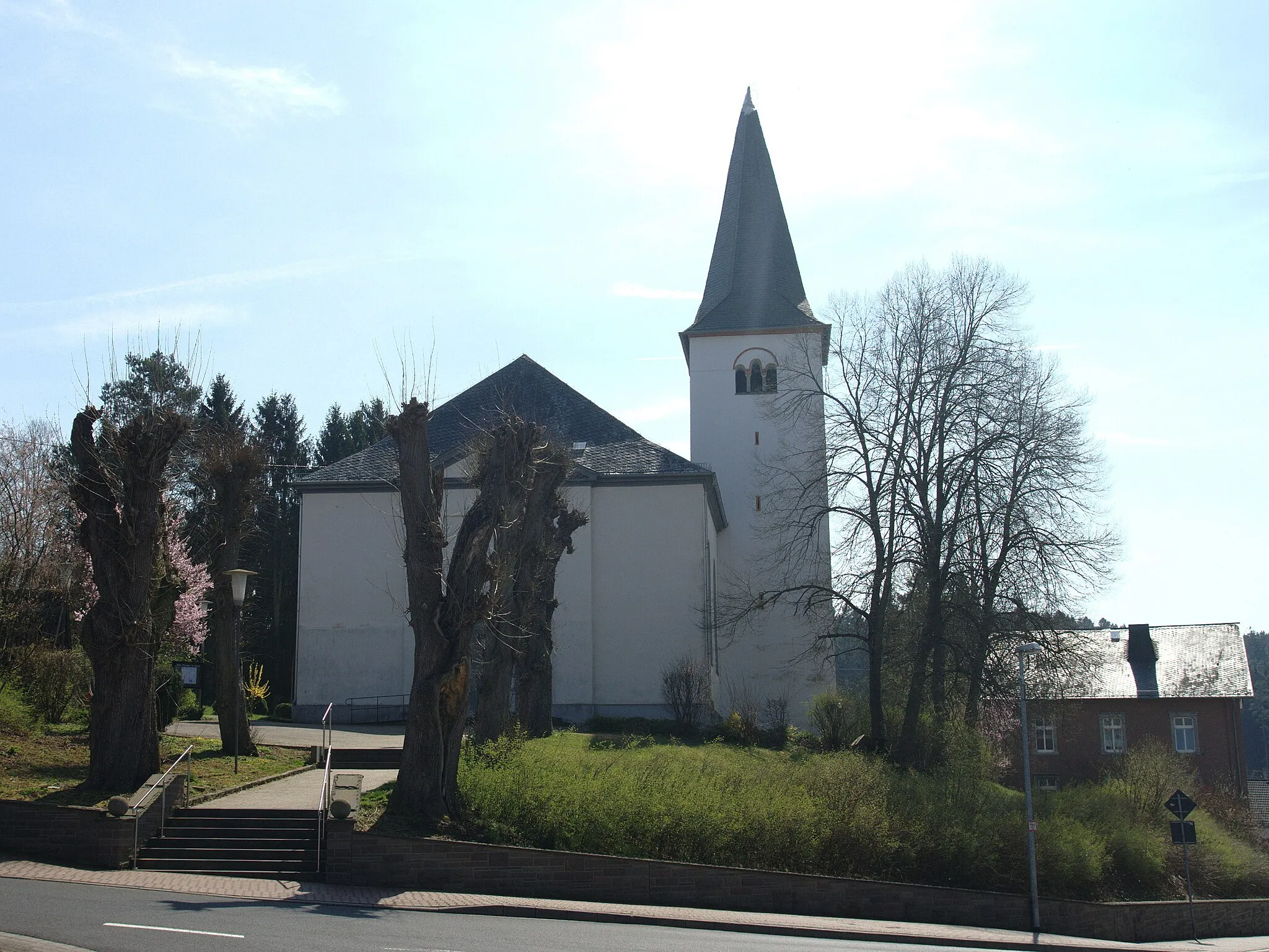 Photo showing: Catholic church St. Georg, 1809, with rectory (right), approx. 1870. Cultural heritage. Location: Hauptstraße 20, Breitenau, Westerwald, Germany