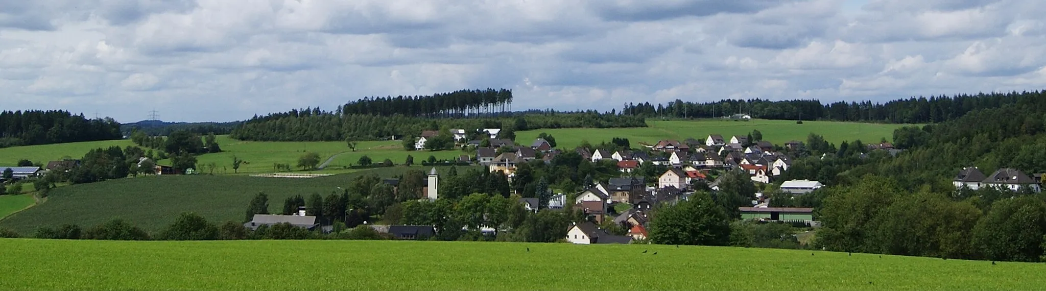 Photo showing: Katzwinkel (Sieg), Germany. Seen from south (taken at Sieg-high route near Kalteich).