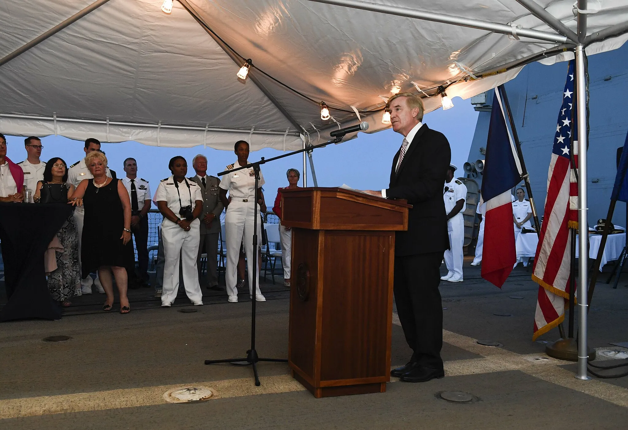 Photo showing: 170815-N-UY653-545

THEOULE-SUR-MER, France (Aug. 15, 2017) Brent Hardt, charge d'affaires, U.S. Embassy, Paris, delivers remarks during a reception aboard the Arleigh Burke-class guided-missile destroyer USS Oscar Austin (DDG 79) in Theoule-sur-Mer, France, Aug. 15, 2017. Oscar Austin is in France to participate in events commemorating the 73rd anniversary of Operation Dragoon, the liberation of southern France by allied forces during World War II. (U.S. Navy photo by Mass Communication Specialist 2nd Class Ryan U. Kledzik/Released)