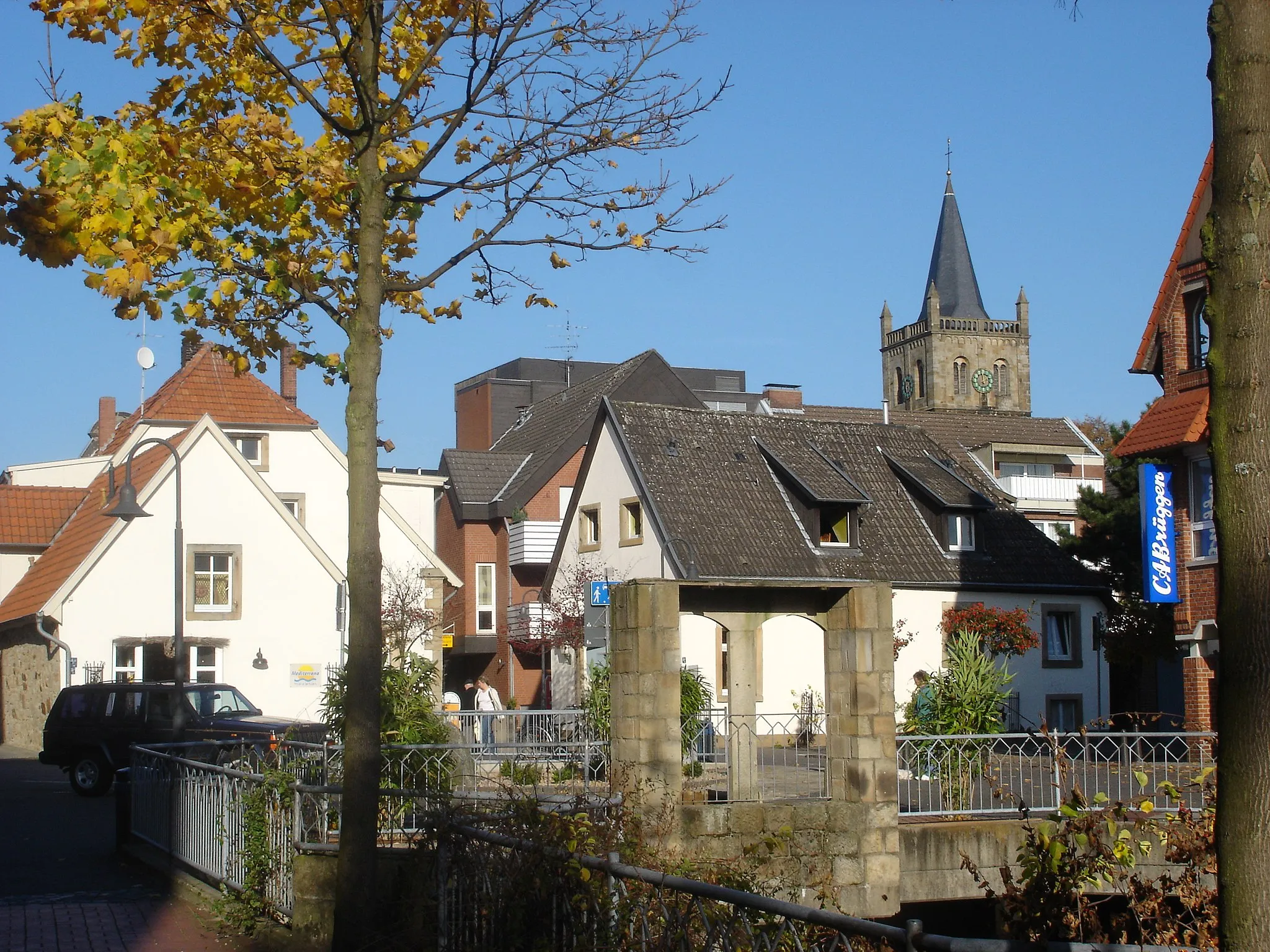 Photo showing: Panoramashot of the city center of Ibbenbüren: "Alter Posthof" with protestantic church "Christuskirche" in the back

This  image shows a heritage building in Germany, located in the North Rhine-Westphalian city Ibbenbüren (no. A 009).

This  image shows a heritage building in Germany, located in the North Rhine-Westphalian city Ibbenbüren (no. A 036).