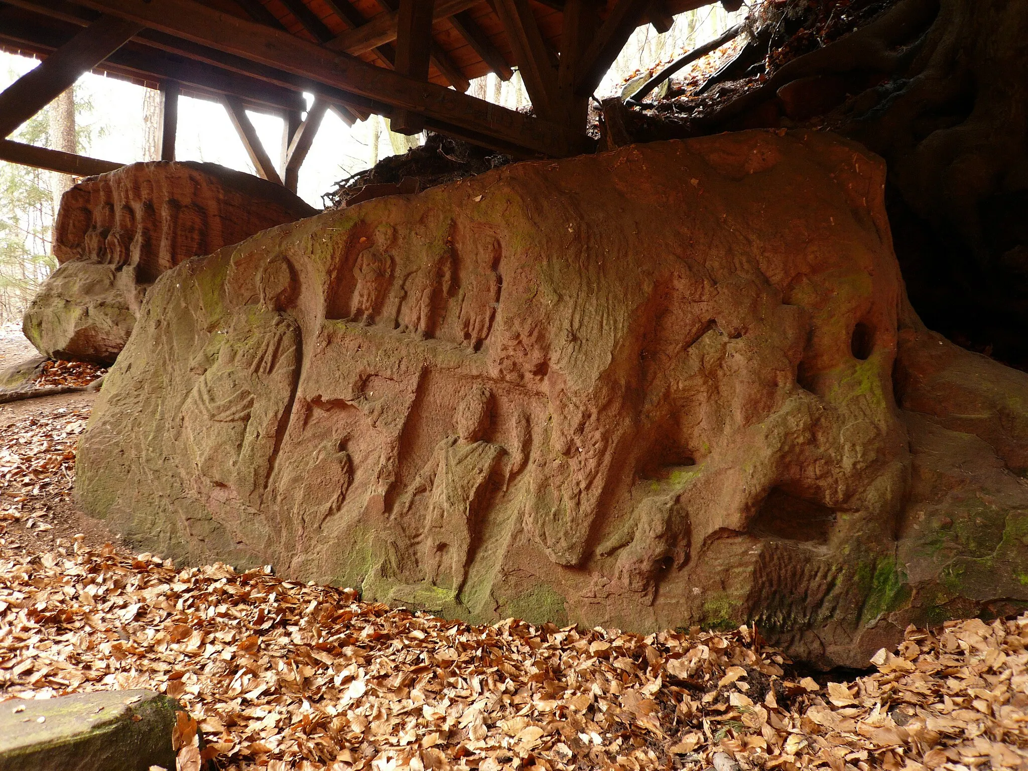 Photo showing: 2nd/3rd century Roman reliefs at the Gallo-Roman sanctuary at Heidenfelsen ("heathen-rock"), near Kindsbach, Pfalz, Germany. The sanctuary is at a natural spring, which the pre-historical peoples of the region (called 'Celtae' by the Romans) held to be sacred. The water from the spring was deemed to cure eye infections. The Romans subsequently adopted these beliefs, and the spring remained a pilgrimage site until the 7th century. A chemical analysis in the 1940s identified the water to be rich in boron, which has anti-bacterial properties.