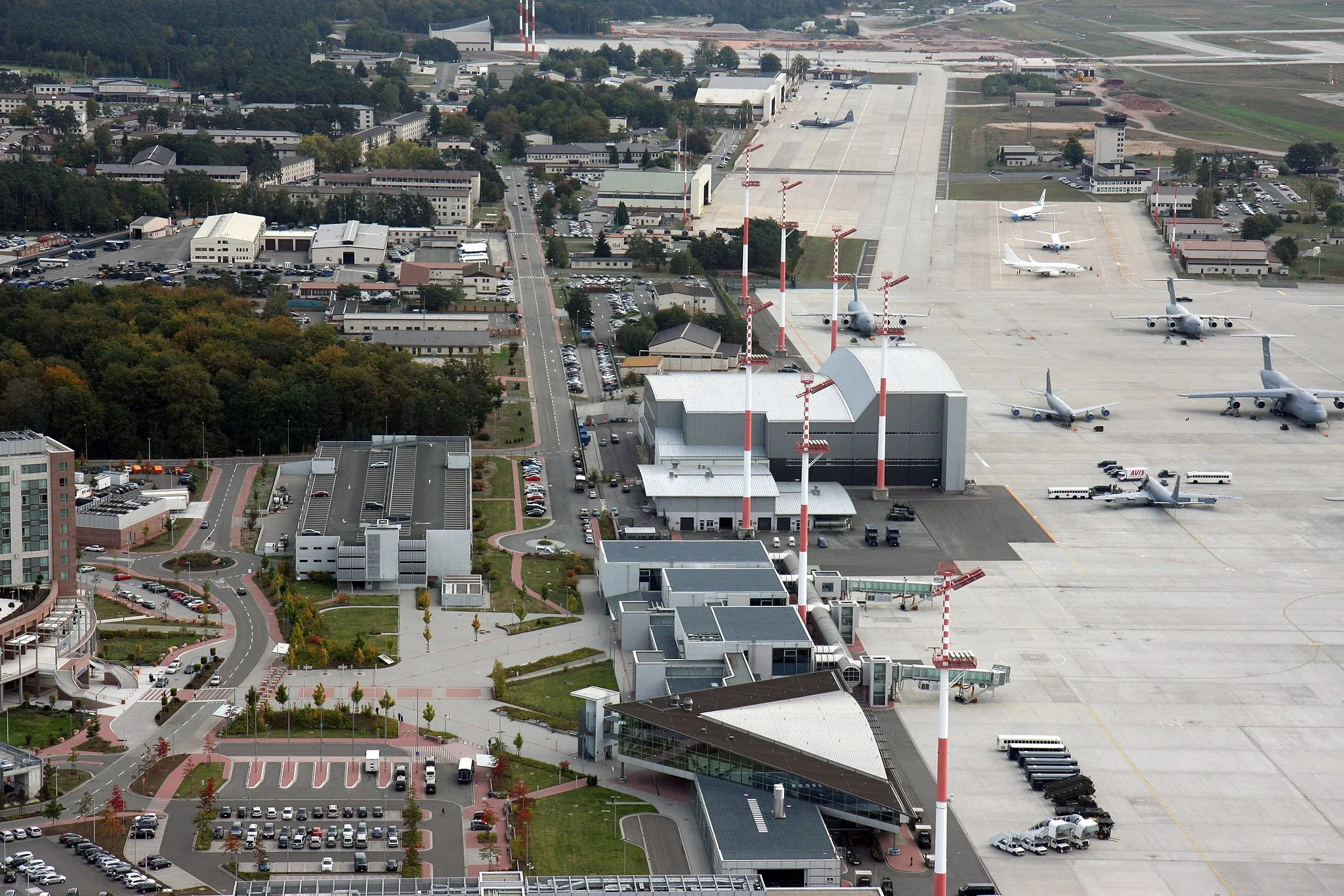 Photo showing: Thanks to the support from the U.S. Army Corps of Engineers Europe District, which managed the construction of new ramps, hangars, warehouses, a passengar terminal and more on the Ramstein flightline, the air base is now a major hub for mobility and airlift operations throughout Europe and downrange, hosting a variety of aircraft on its flightline. (U.S. Army Corps of Engineers photo by Justin Ward)