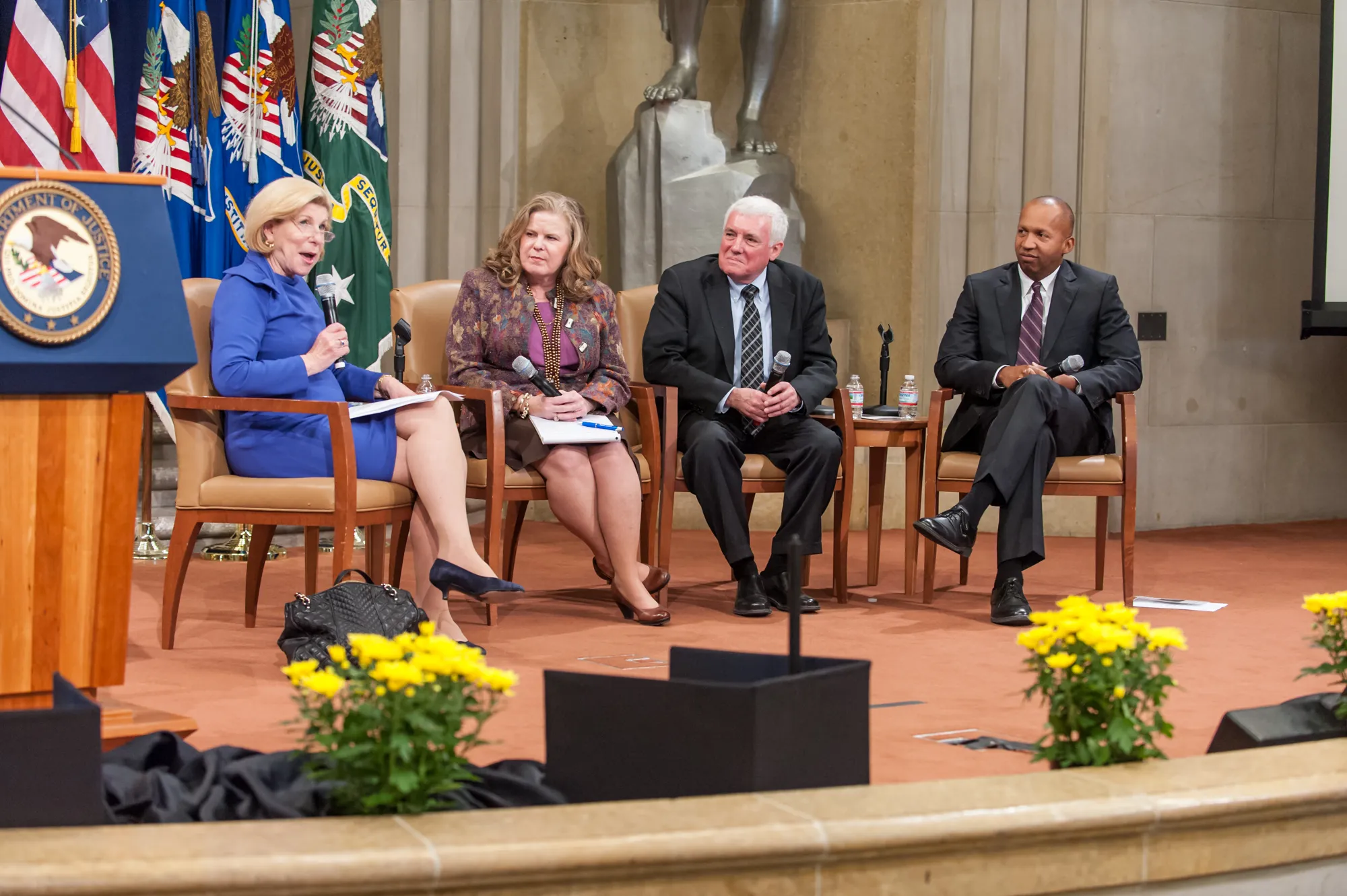 Photo showing: This image depicts Sue Bell Cobb, Chief Justice of the Supreme Court for the State of Alabama (second from left) at a panel discussion held by the Department of Justice on the subject of the court decision of Gideon v. Wainwright on March 15, 2013.