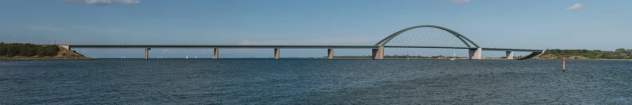 Photo showing: A panoramic image of the Fehmarn Sound Bridge as seen from Großenbroderfähre, located southeast of the German mainland