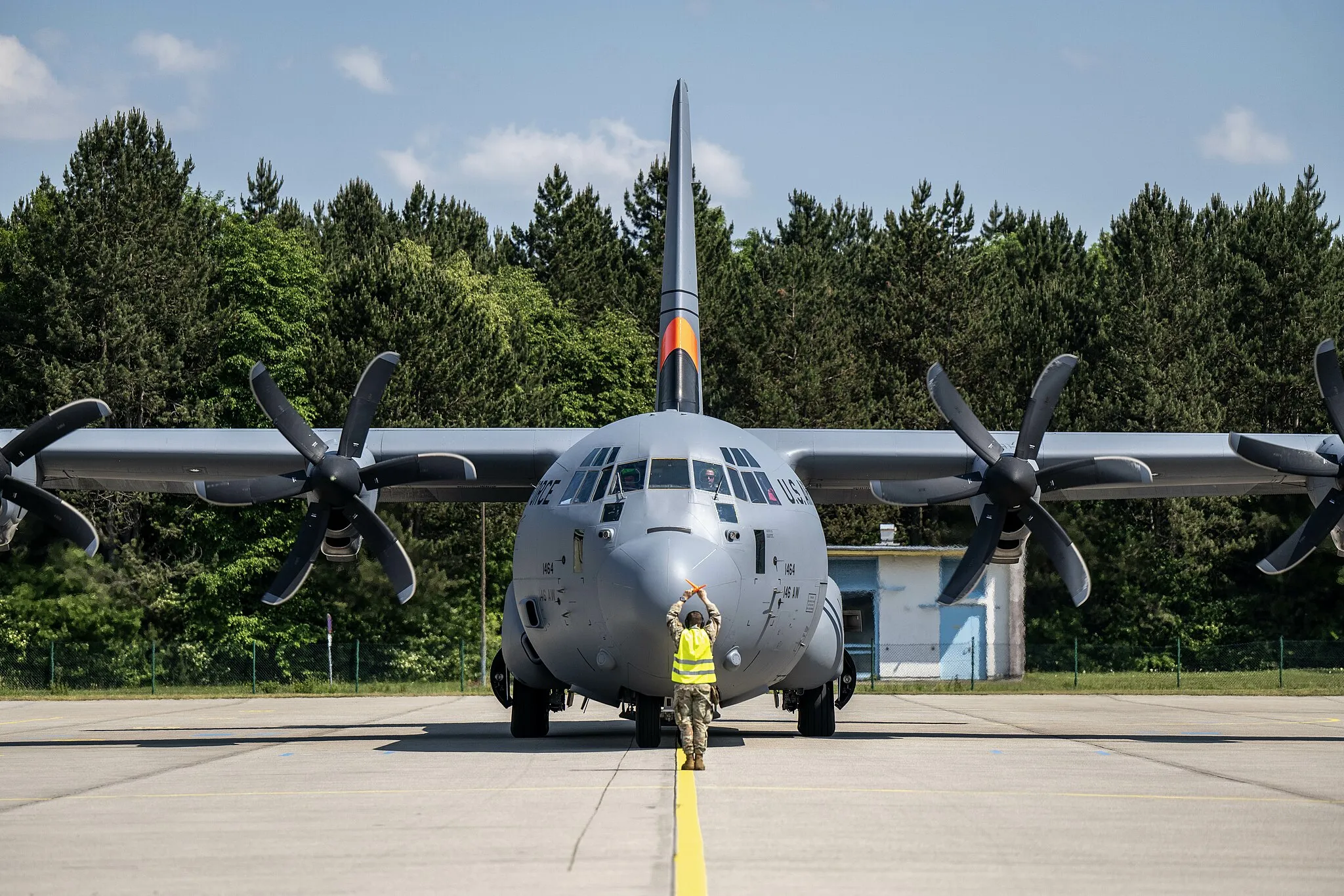 Photo showing: A U.S. Air Force C-130J Super Hercules aircraft assigned to the 146th Airlift Wing, California National Guard, taxis into Lechfeld Air Base, Germany in preparation for exercise Air Defender 2023 (AD23), June 7, 2023. Exercise AD23 integrates both U.S. and allied air-power to defend shared values, while leveraging and strengthening vital partnerships to deter aggression around the world. (U.S. Air National Guard photo by Staff Sgt. Joseph R. Morgan)