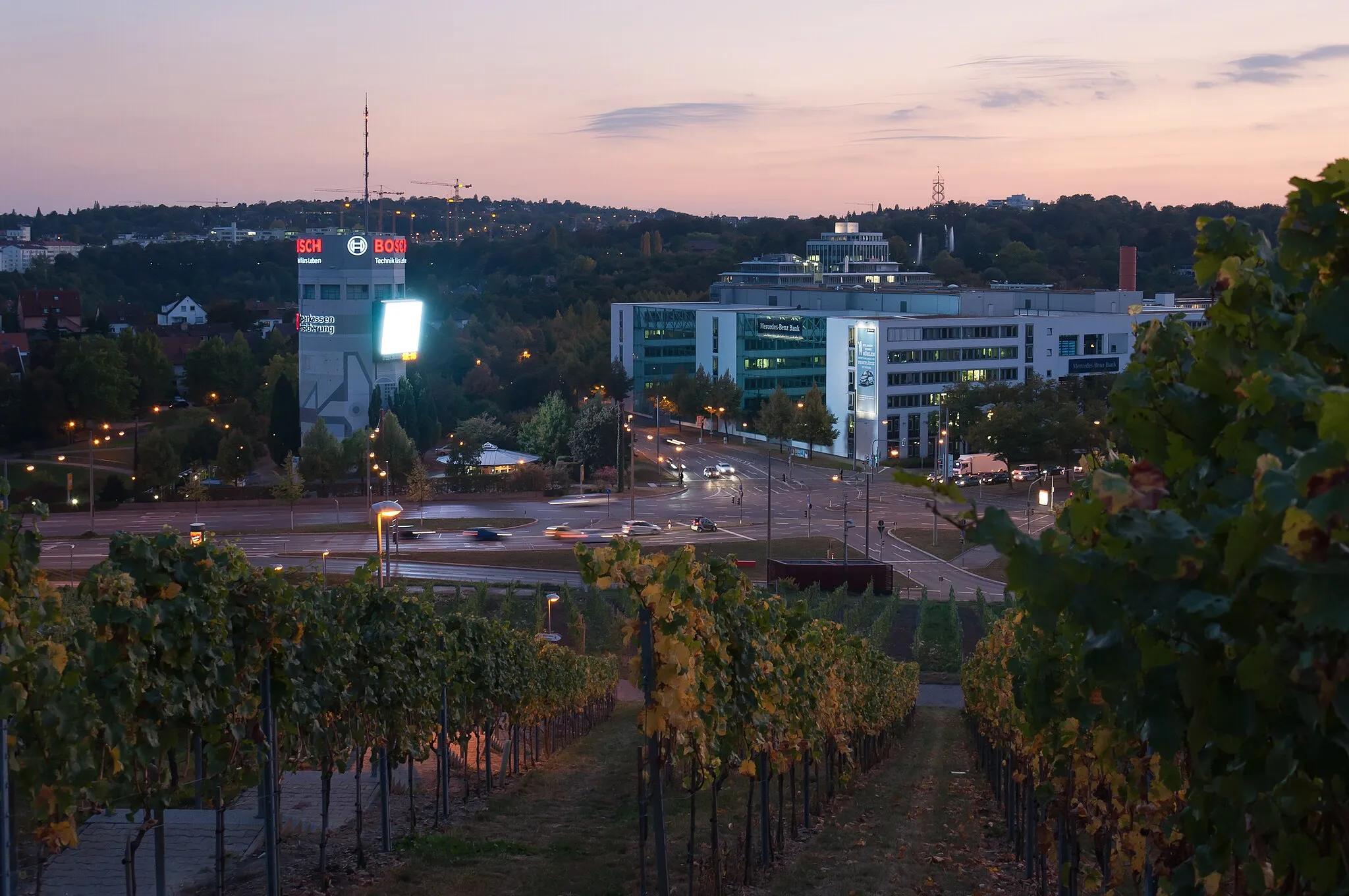 Photo showing: Pragsattel in Stuttgart (Germany) in the evening. Air-raid shelter on the left, the building of the Mercedes-Benz Bank on the right.