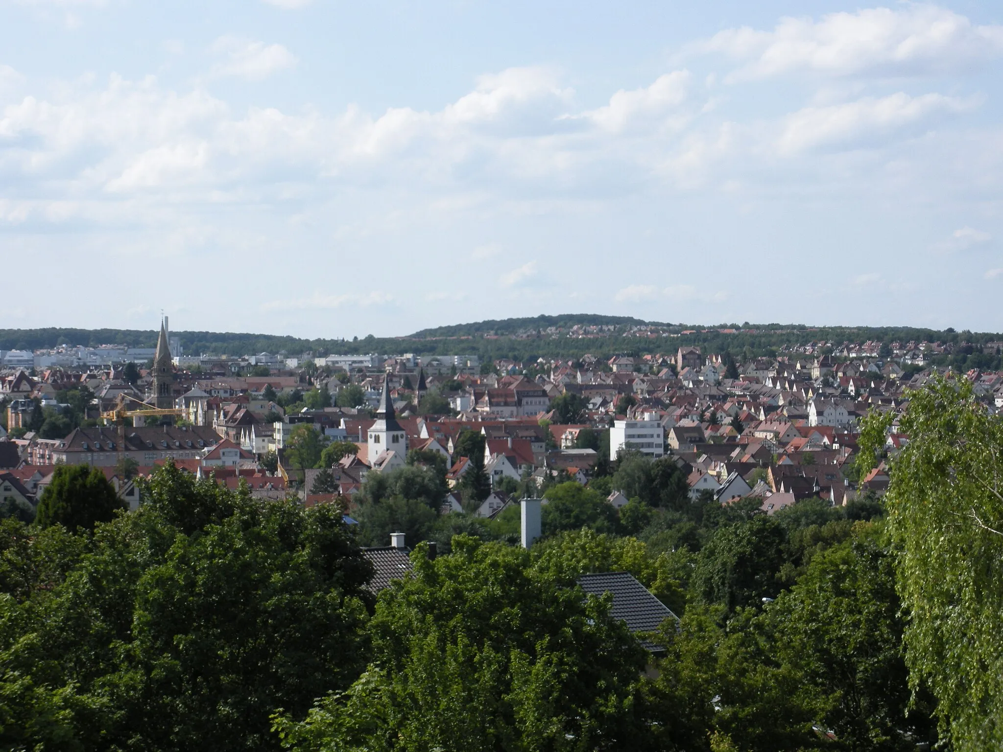Photo showing: Blick über den Kernbereich (City) des Stadtbezirks Zuffenhausen in Stuttgart mit den Türmen der Evang. Paulus- und Johanneskirche