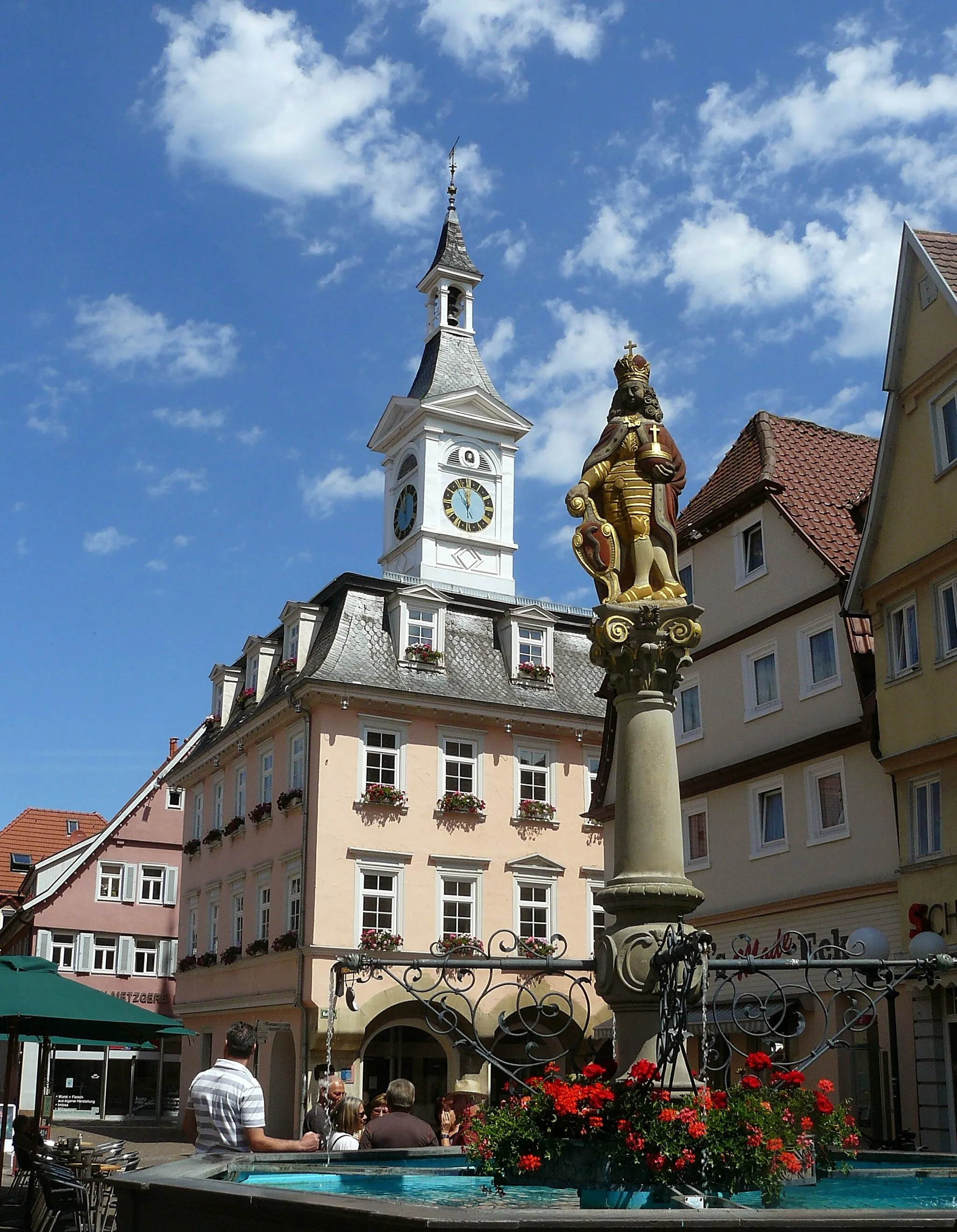 Photo showing: The old town hall in Aalen, Baden-Württemberg, behind a statue of the emperor Joseph I. (which is on top of the marketplace fountain).