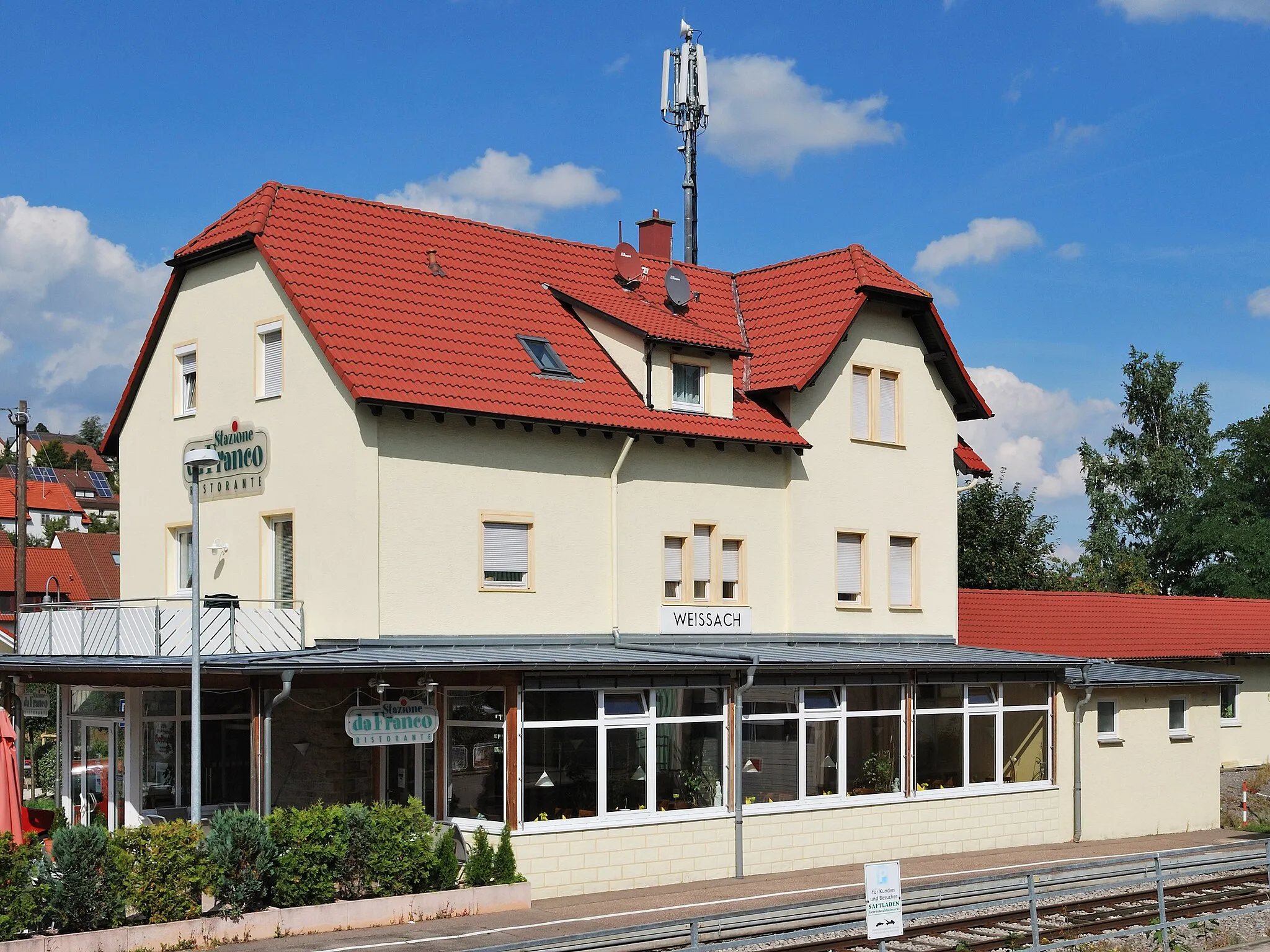 Photo showing: The railway building in Weissach in Southern Germany.