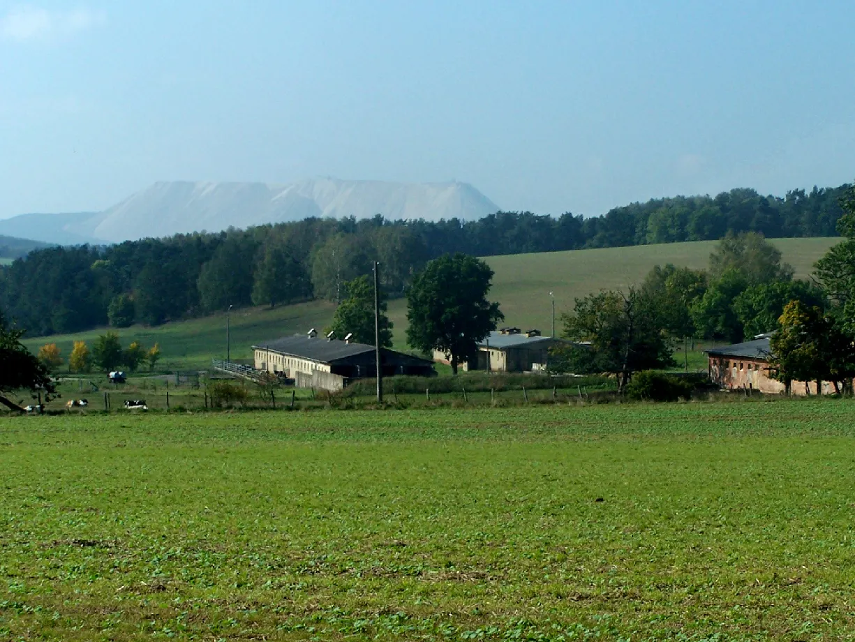 Photo showing: The buildings of a agricultural enterprise in Abteroda.  Behind the Monte Kali at Heringen.