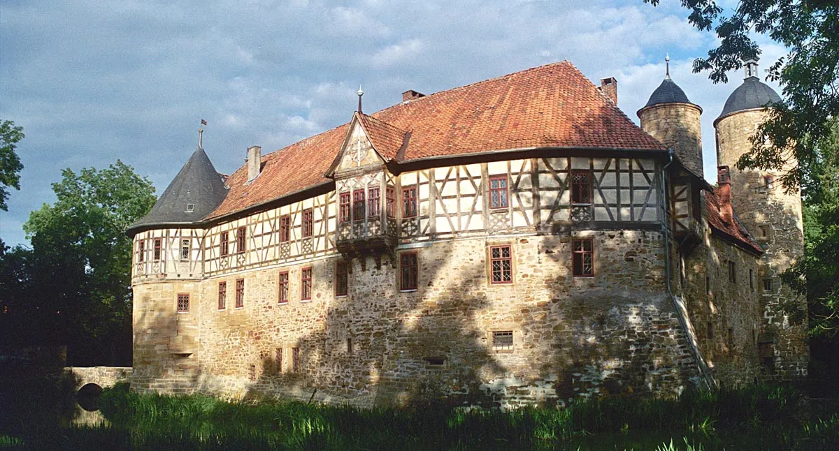 Photo showing: photo of Irmelshausen taken from south-west side, two photos taken as same time and electronically stitched together