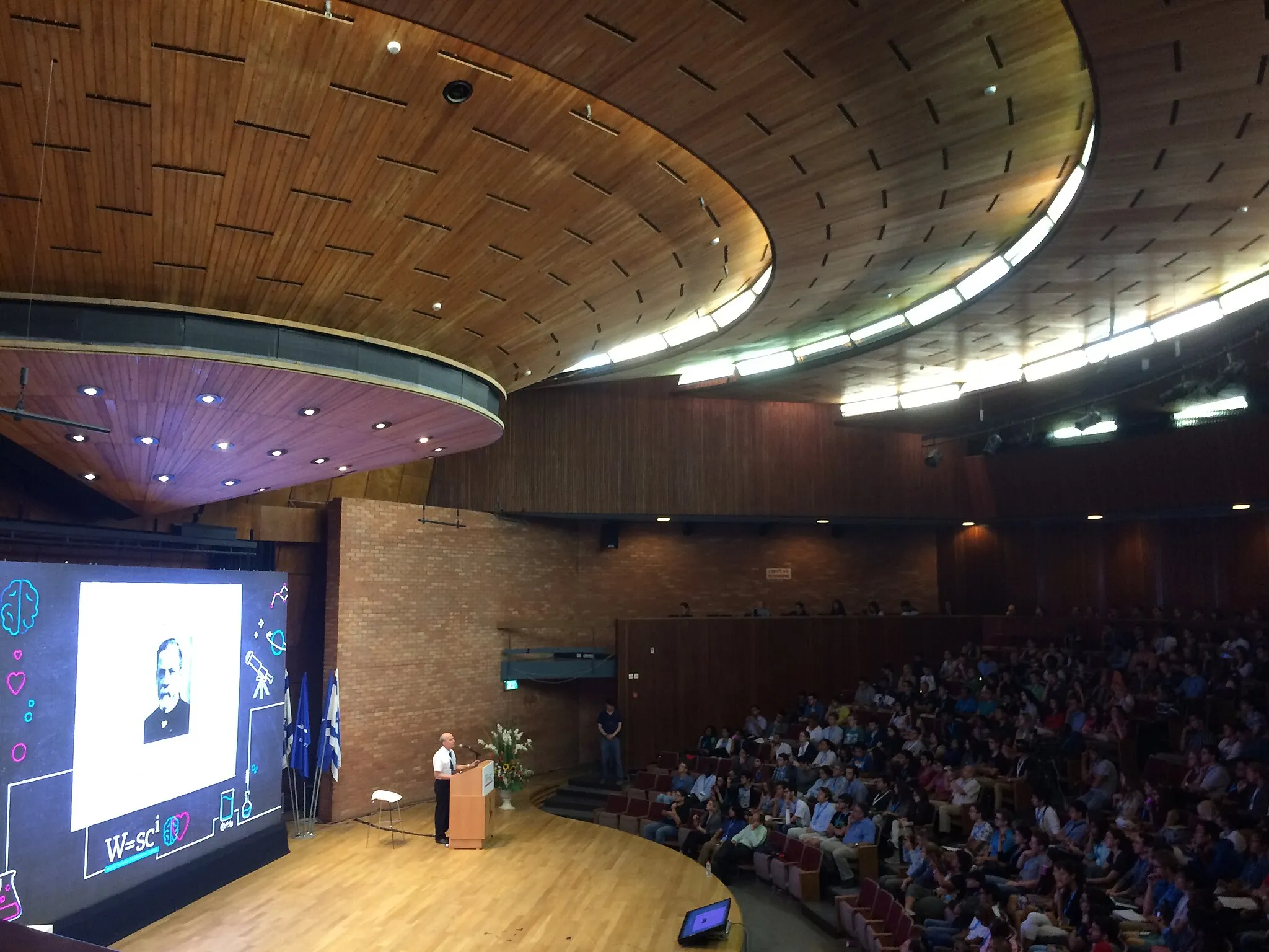 Photo showing: Roger David Kornberg is an American 2006 Nobel Prize Laureate for his work "the molecular basis of eukaryotic transcription." He is a biochemist and professor at Stanford University School of Medicine. Giving lecture at World Science Conference Israel 2015, Jerusalem.