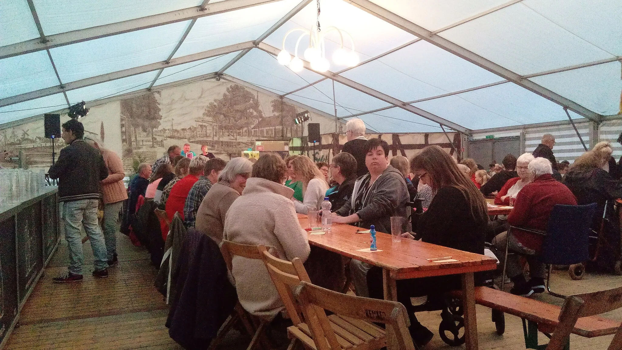 Photo showing: People playing a game of Bingo in the Groninger village of Rhederbrug, Westerwolde.