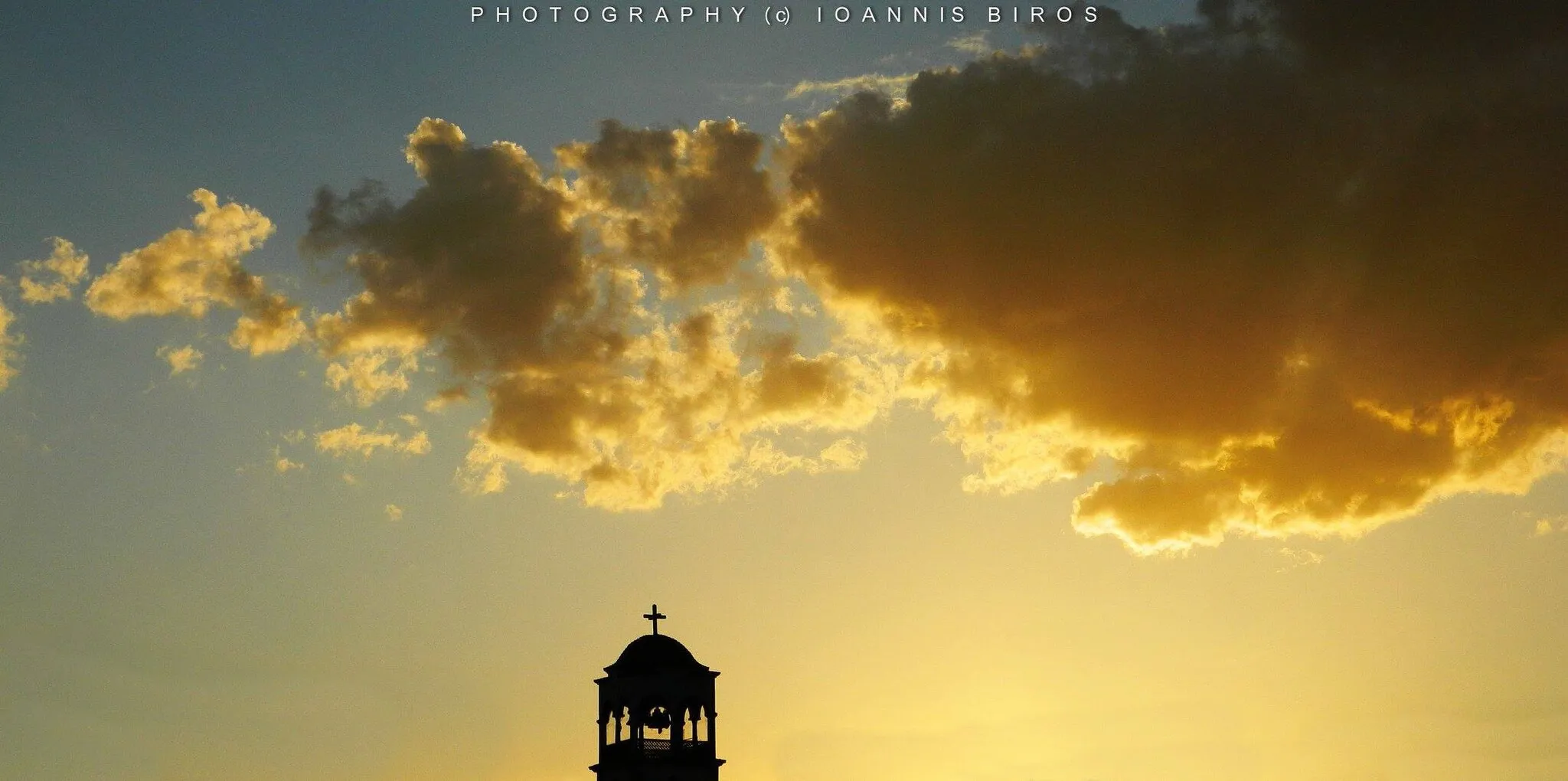 Photo showing: Ηλιοβασιλεμα στο Καλαμπάκι με το καμπαναριο του Αγιου Γεωργιου