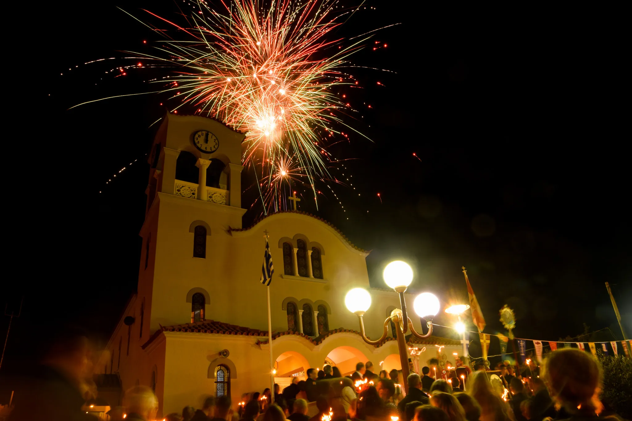 Photo showing: 500px provided description: The moment of singing 'Christos Anesti', at midnight stroke in Holly Saturday before Pascha Sunday in Greek Parcha celebrations. [#church ,#night ,#crowd ,#candles ,#fireworks ,#light bulb ,#Greece ,#Athens ,#Easter ,#Attiki ,#Pireas ,#Pascha ,#Kastela ,#Profitis Ilias ,#Christ's Resurrection]