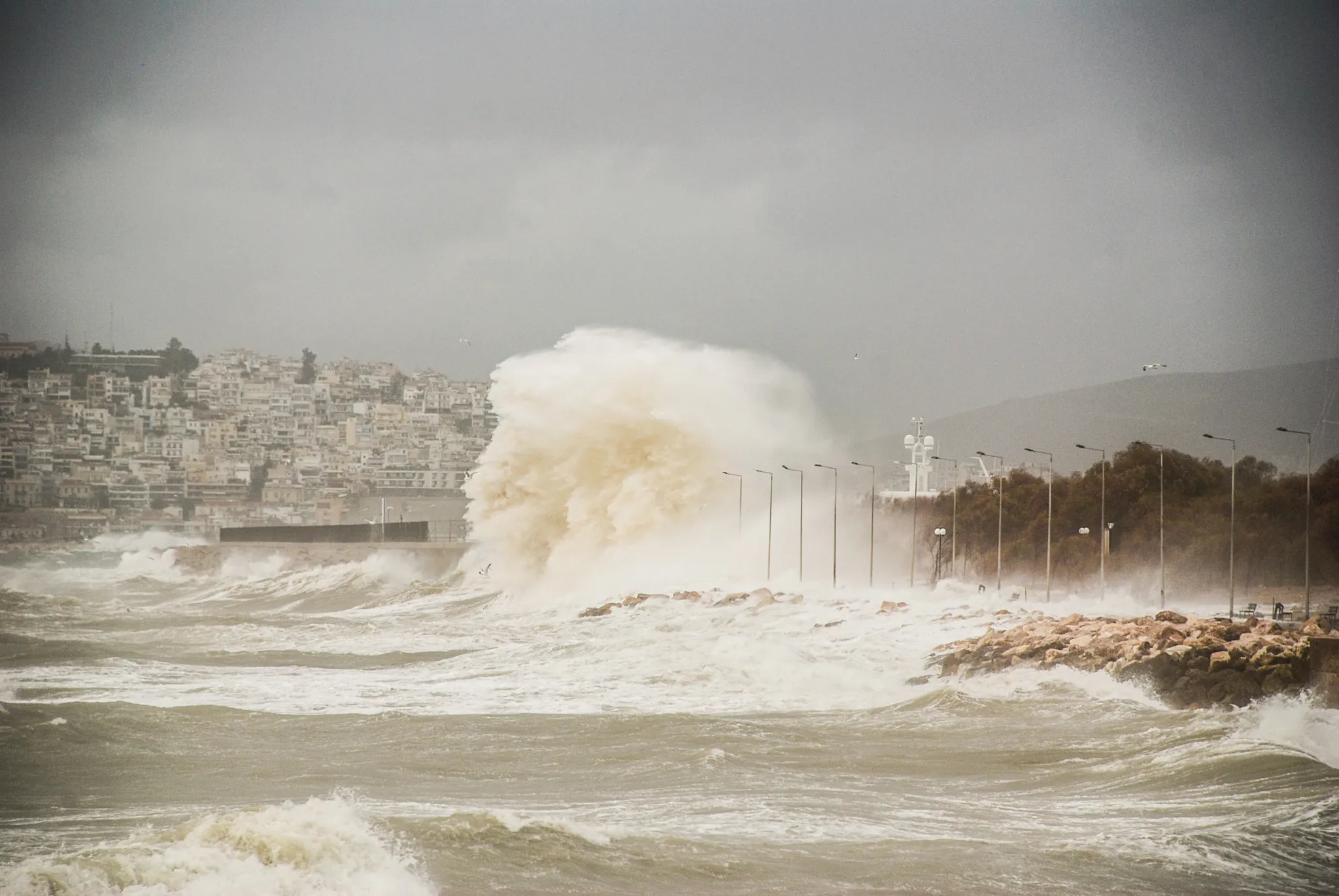 Photo showing: 500px provided description: Wave hitting the coast of athens during a wind storm, [#wind ,#wave ,#grece ,#big wave ,#Grecia ,#greek storm]