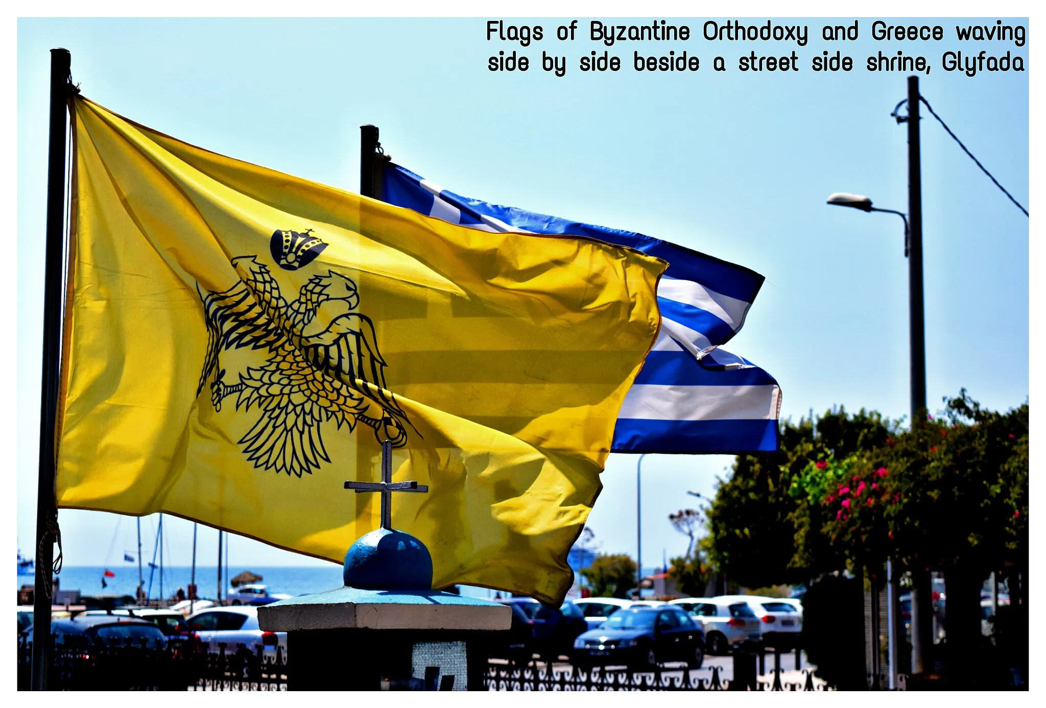 Photo showing: Byzantine flag, signifying Greek Orthodox Faith and the Diocese of Constantinople, flying alongside Greek flag in Glyfada, Athens, Greece