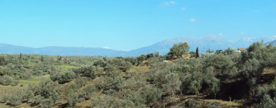 Photo showing: Pimenochori village (Boudoureika), Achaia, Greece. In the background stands Erymanthos Mt.