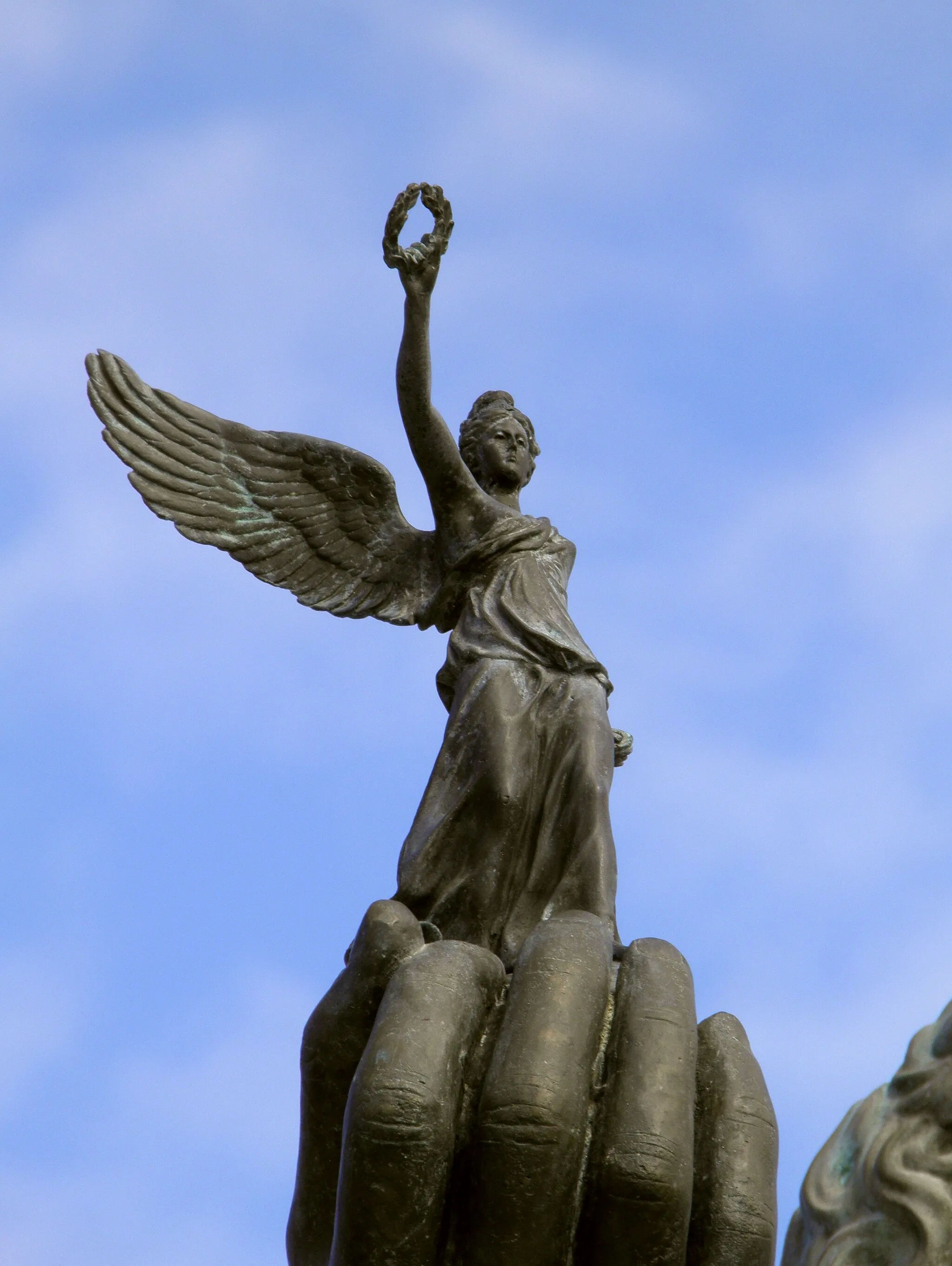 Photo showing: Statue of Alexander the Great riding Bucephalus and carrying a winged statue of Nike (square of Alexander the Great) in Pella city, detail of Nike