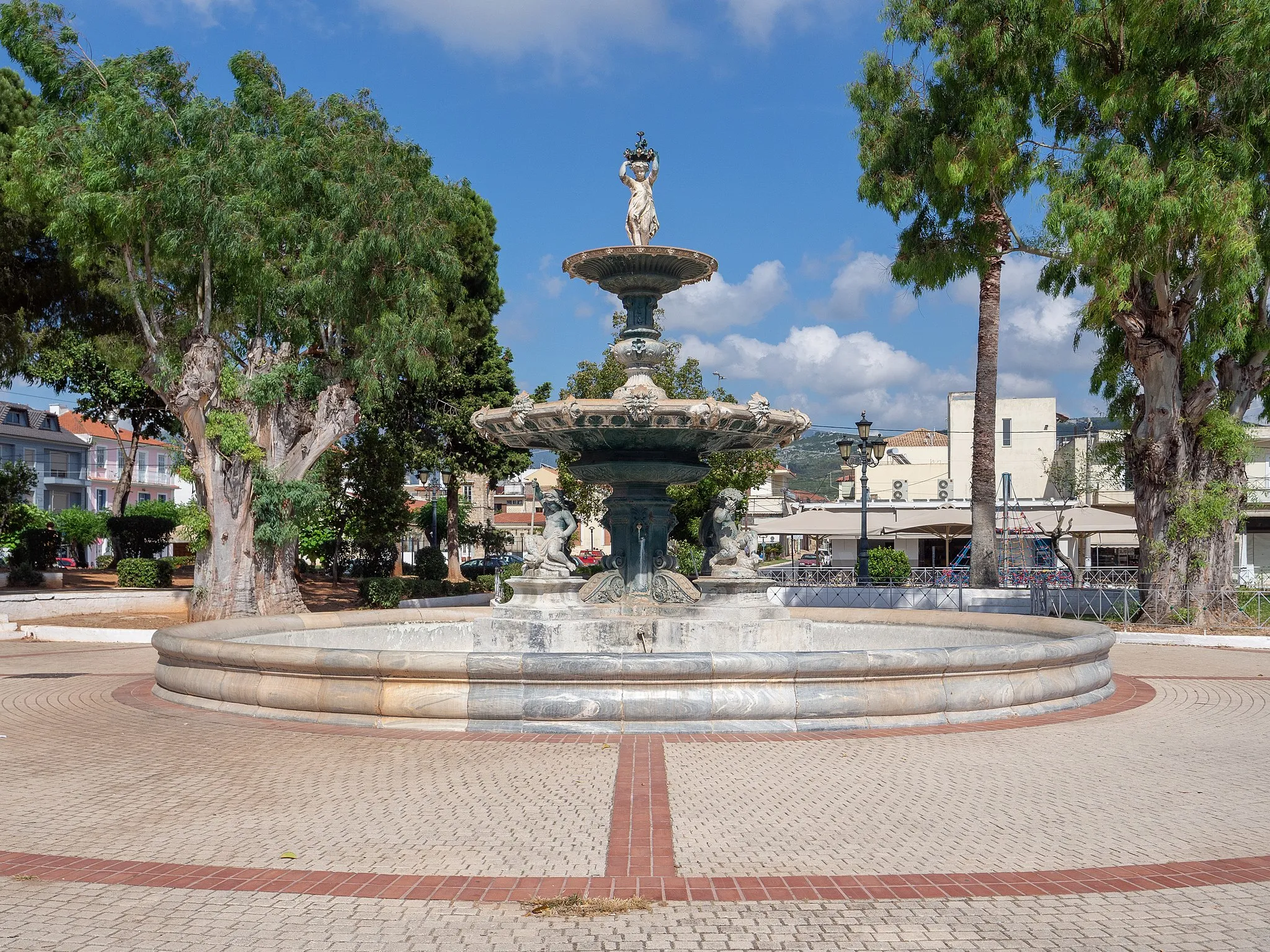 Photo showing: The large cast iron fountain in the main square of Filiatra, Greece. It was built in 1871.