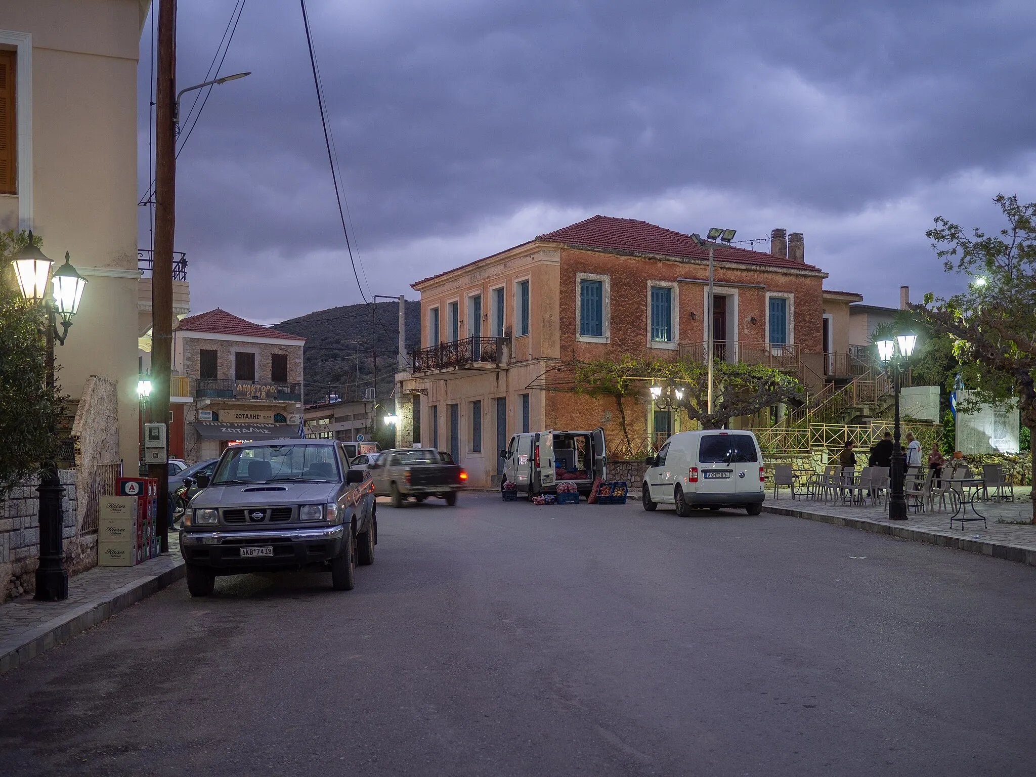 Photo showing: The main square of Niata, Laconia, at dusk.