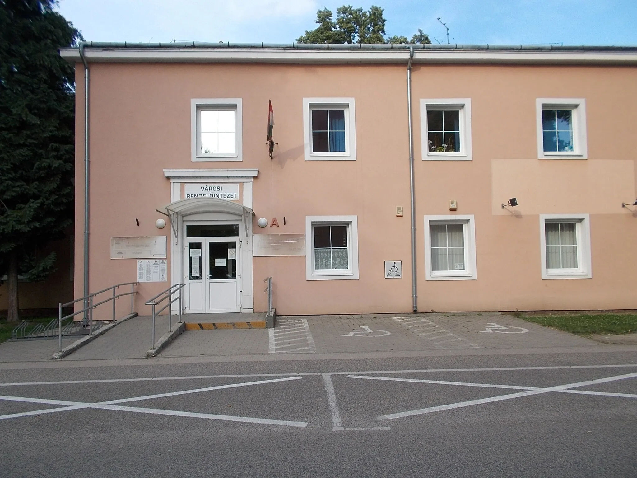 Photo showing: : City Clinic? General Practice. AND Veszprém County Tax and Customs Directorate  of the National Tax and Customs Administration of Hungary (NTCA) - Semmelweis utca and Petőfi Sándor utca corner, Ajka, Veszprém County, Hungary.