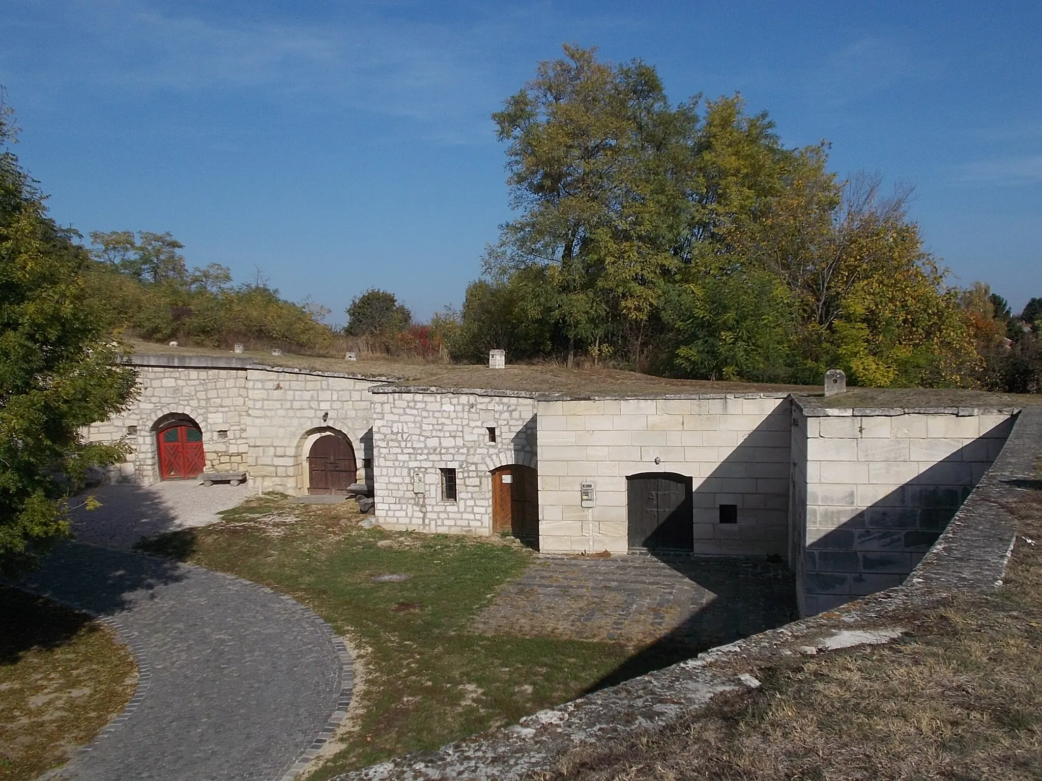 Photo showing: : Circle cellar line. Listed complex. 31 cellars. Stone cellars were built in the mid-1860s - Etyek, Fejér County, Hungary.
