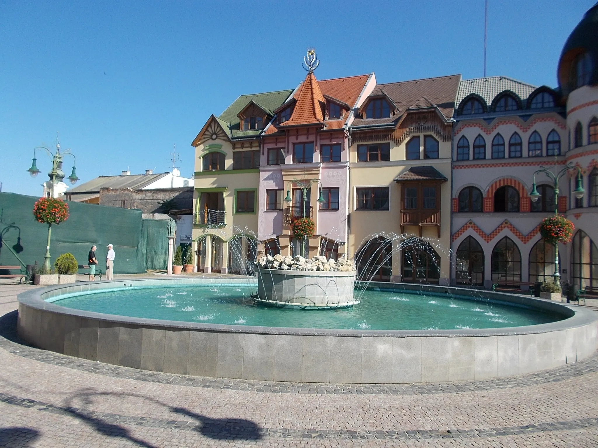 Photo showing: Fountain and northeast part of the The Europe Place, Komárno, Slovakia.