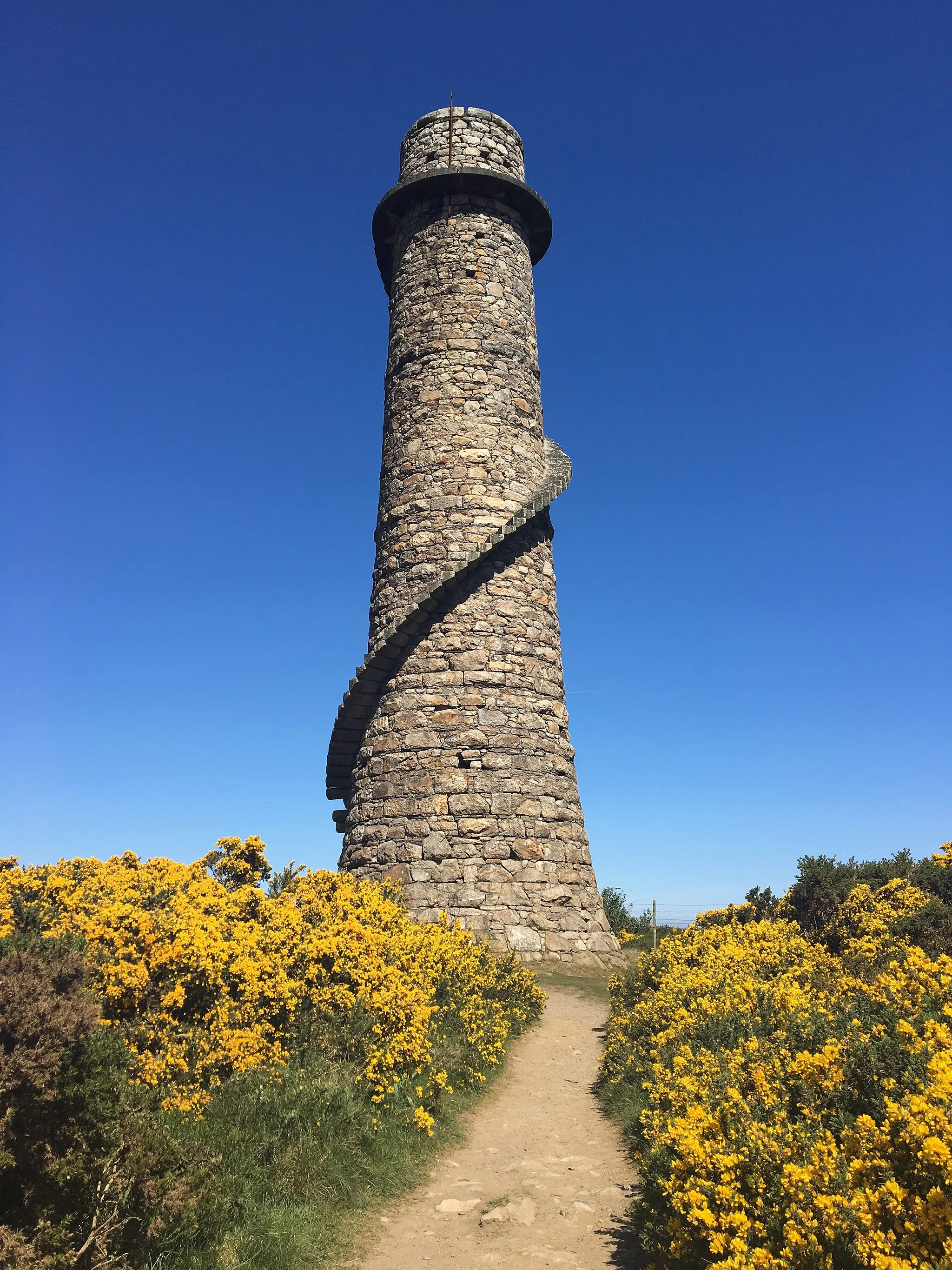 Photo showing: A picture of Ballycorus Lead Mines, County Dublin, surrounded by yellow flowers and featuring a cloudless blue sky