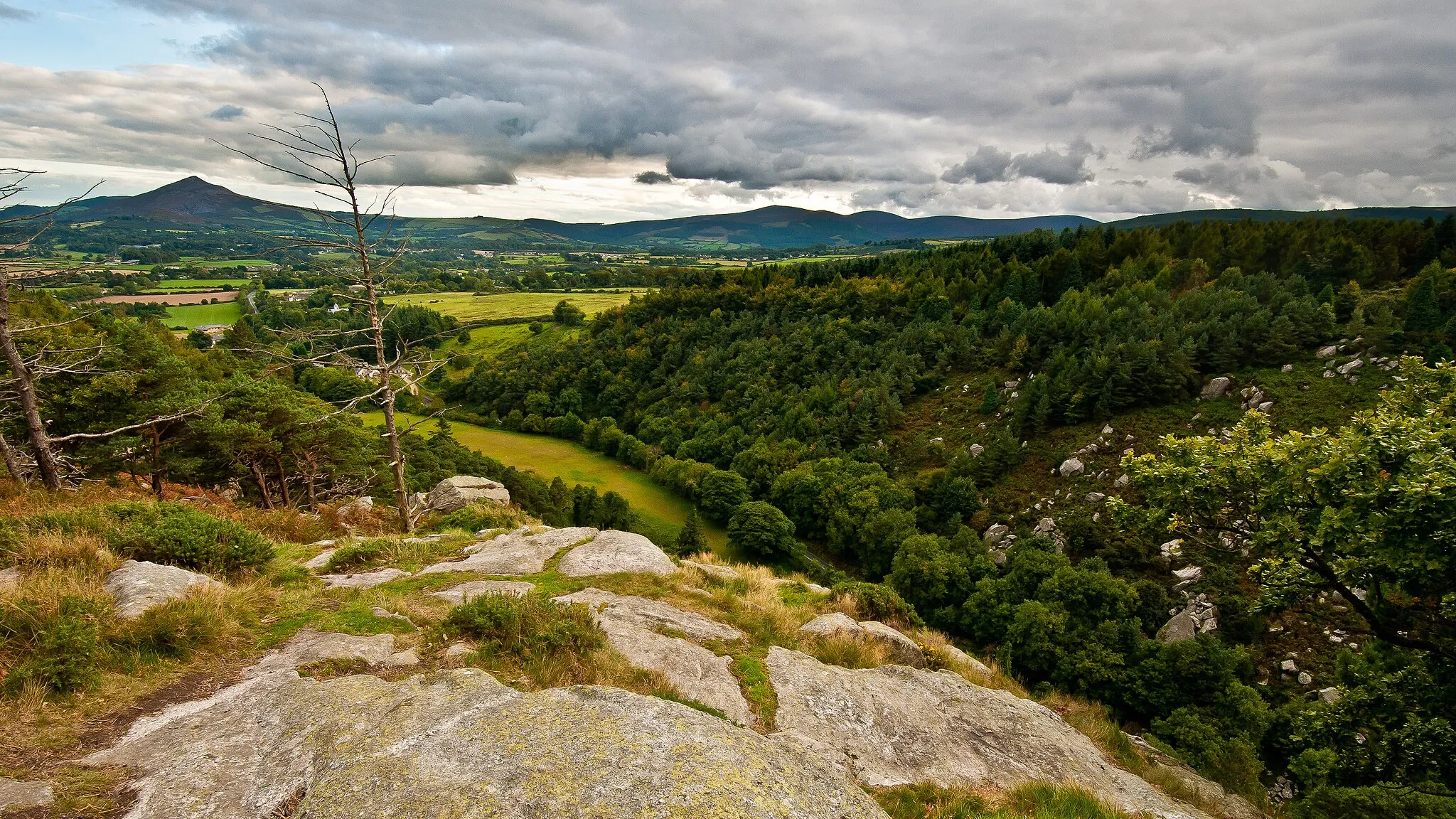 Photo showing: Looking south down The Scalp towards the Great Sugar Loaf from the summit of Barnaslingan Hill