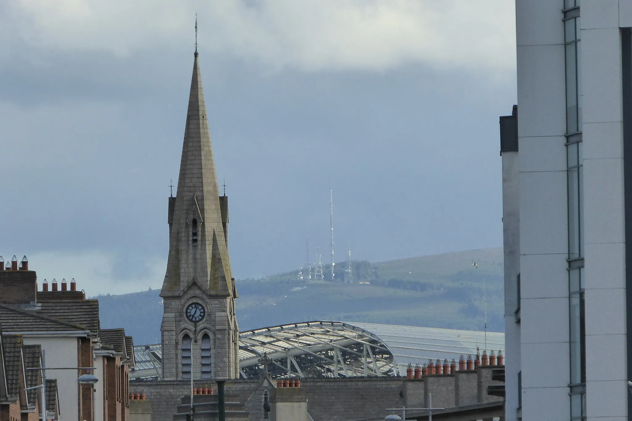 Photo showing: St. Patricks' church, Ringend is visible in the foreground, the Aviva stadium is behind it and in the background is Three Rock Mountain.