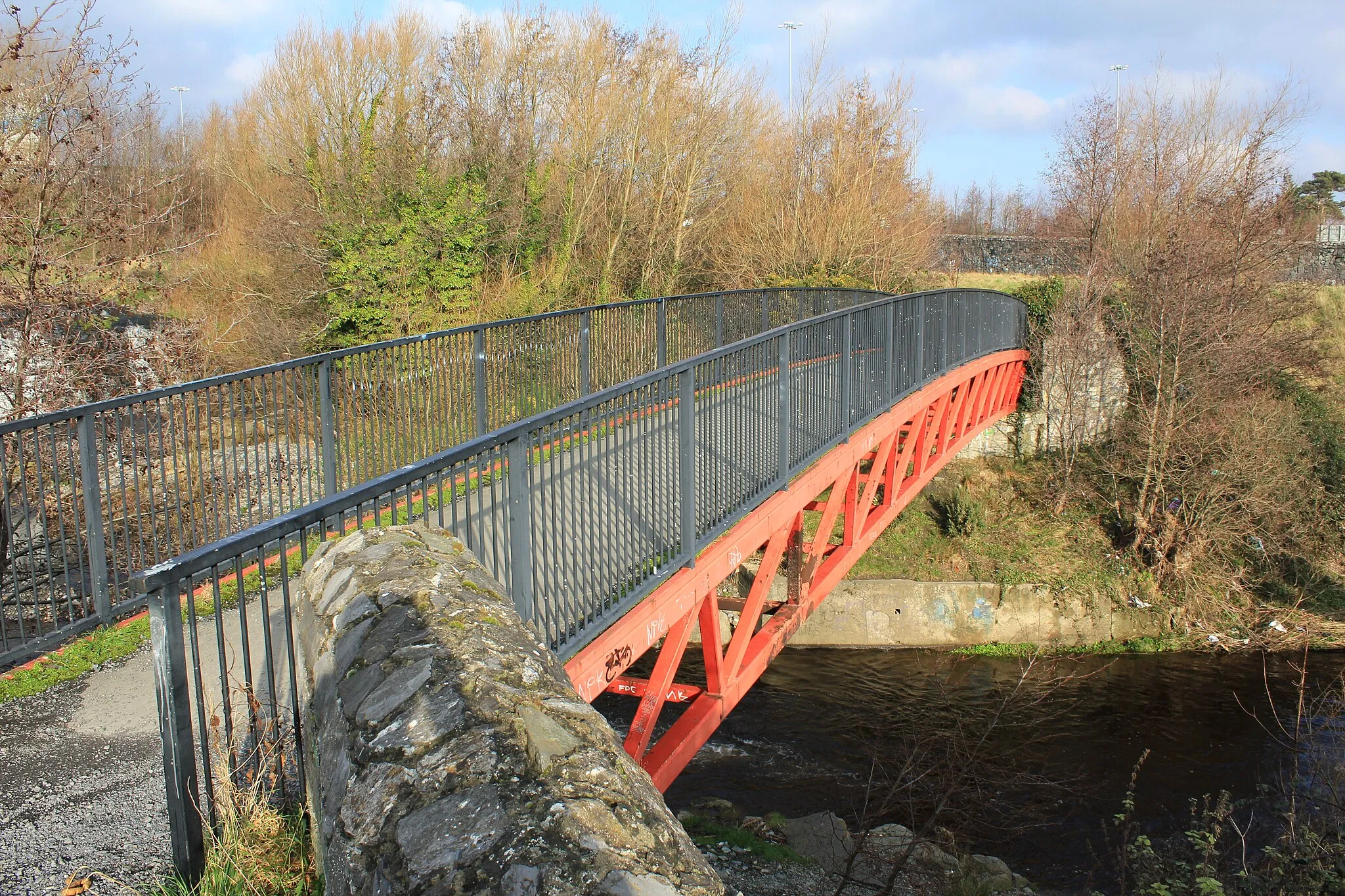 Photo showing: Footbridge over the River Dodder near the M50 motorway.