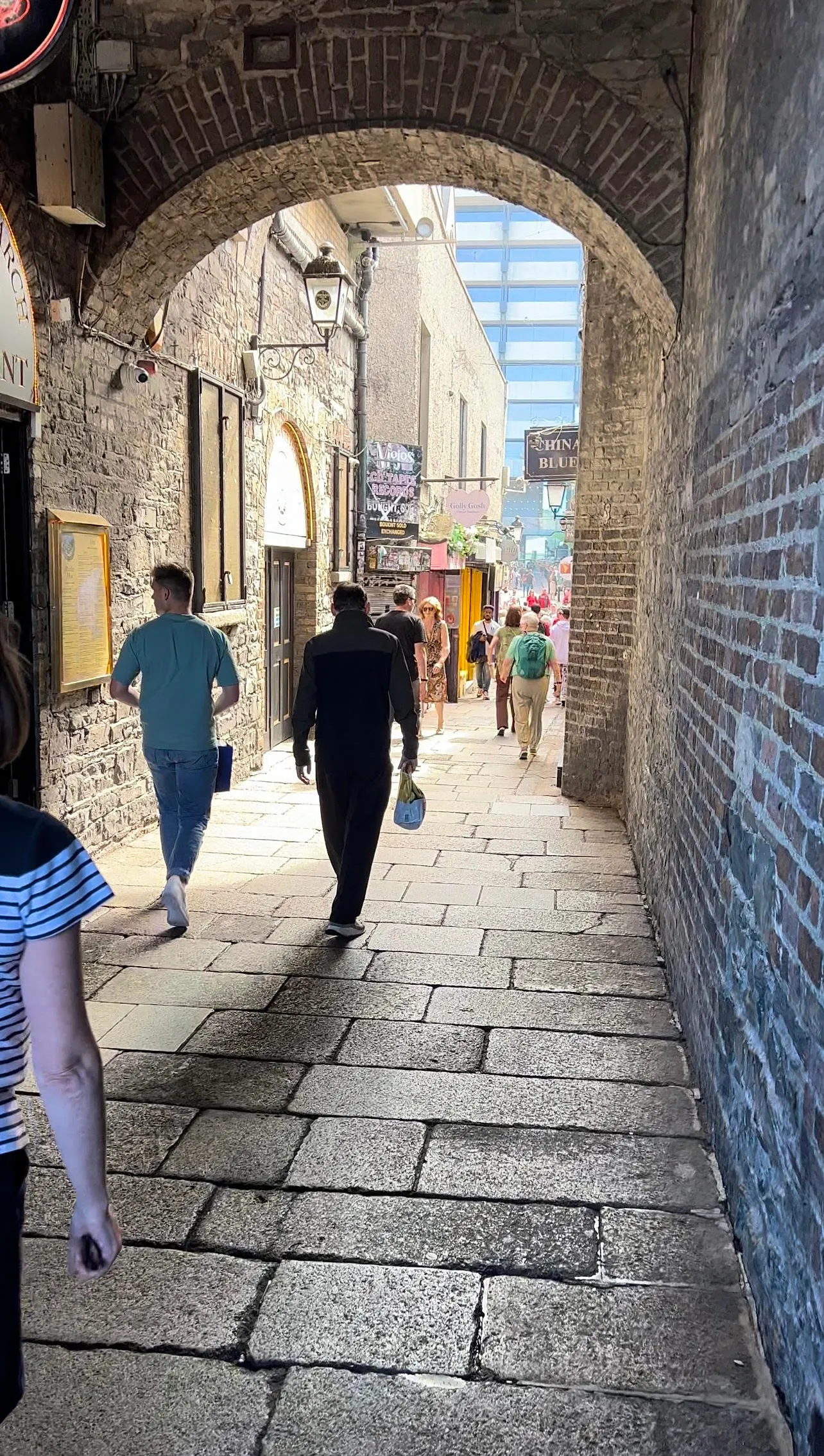 Photo showing: A view through Merchant's Arch with the former Central Bank offices in the background.