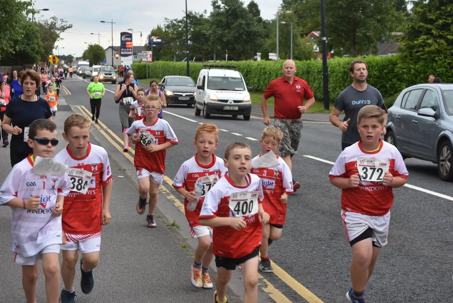 Photo showing: This is a photograph from the 8th annual Kinnegad 5KM Road Race and Fun Run 2017 which was held in the town of Kinnegad, Co. Westmeath, Ireland on Wednesday 5th July 2017 at 20:00. This race has firmly established itself on the local race calendar and yet again the race retains wonderful support from local clubs and runners. The race was first run in 2010 and has used the same route for each of the eight runnings of the race. The race is a right handed course, flat and fast and takes runners on a traffic free route which includes 3KM on the local road 'Boreen Bradach'. The boreen is a flat and sheltered by hedgerow and is a well used local walking and running route.  The boreen benefits from a new surface which was applied over the last two years.  The boreen emerges onto the main street with the finish is on this famous main street of Kinnegad in front of Harry's Hotel. This streetscape will be well known to many many people who traveled between the east and west of Ireland before the arrival of the motorway system which we have today. Kinnegad is situated at the intersection of the both the M6 Galway bound motorway and the M4 Sligo/Mayo bound motorway.
Something about WEATHER

Overall the race was very well organised and there was Garda help with traffic control in the town for the start and finish of the race. The race is organised by Coralstown Kinnegad GAA Club with proceeds from the race going towards the development of the club.

The location of the START (goo.gl/maps/JWpnK) and FINISH (goo.gl/maps/es2Up) of the race are shown on Google Maps. Prize giving, refreshments, parking and registration is at Kinnegad GAA club just off the old Mullingar Road about 500m from the start (goo.gl/Ia9cIR)

Our full set of photographs from tonight's race is available here www.flickr.com/photos/peterm7/albums/72157685768130326

Photographs from Previous Kinnegad 5km Road Races
2016: www.flickr.com/photos/peterm7/albums/72157671016784465
2015: www.flickr.com/photos/peterm7/sets/72157653300652864
2014: www.flickr.com/photos/peterm7/albums/72157645584938282
2013: www.flickr.com/photos/peterm7/sets/72157634580196967/
2012: www.flickr.com/photos/peterm7/sets/72157630534171096/
2011: www.flickr.com/photos/peterm7/sets/72157627186893850/
2010: www.flickr.com/photos/peterm7/sets/72157624580703513

Can I use these photographs directly from Flickr on my social media account(s)?
Yes - of course you can! Flickr provides several ways to share this and other photographs in this Flickr set. You can share directly to: email, Facebook, Instagram, Pinterest, Twitter, Tumblr, LiveJournal, and Wordpress and Blogger blog sites. Your mobile, tablet, or desktop device will also offer you several different options for sharing this photo page on your social media outlets.
BUT..... Wait there a minute....
We take these photographs as a hobby and as a contribution to the running community in Ireland. We do not charge for our photographs. Our only "cost" is that we request that if you are using these images: (1) on social media sites such as Facebook, Tumblr, Pinterest, Twitter,LinkedIn, Google+, VK.com, Vine, Meetup, Tagged, Ask.fm,etc or (2) other websites, blogs, web multimedia, commercial/promotional material that you must provide a link back to our Flickr page to attribute us or acknowledge us as the original photographers.
This also extends to the use of these images for Facebook profile pictures. In these cases please make a separate wall or blog post with a link to our Flickr page. If you do not know how this should be done for Facebook or other social media please email us and we will be happy to help suggest how to link to us.
I want to download these pictures to my computer or device?
You can download this photographic image here directly to your computer or device. This version is the low resolution web-quality image. How to download will vary slight from device to device and from browser to browser. Have a look for a down-arrow symbol or the link to 'View/Download' all sizes. When you click on either of these you will be presented with the option to download the image. Remember just doing a right-click and "save target as" will not work on Flickr.
I want get full resolution, print-quality, copies of these photographs?
If you just need these photographs for online usage then they can be used directly once you respect their Creative Commons license and provide a link back to our Flickr set if you use them. For offline usage and printing all of the photographs posted here on this Flickr set are available free, at no cost, at full image resolution.
Please email petermooney78 AT gmail DOT com with the links to the photographs you would like to obtain a full resolution copy of. We also ask race organisers, media, etc to ask for permission before use of our images for flyers, posters, etc. We reserve the right to refuse a request.
In summary please remember when requesting photographs from us - If you are using the photographs online all we ask is for you to provide a link back to our Flickr set or Flickr pages. You will find the link above clearly outlined in the description text which accompanies this photograph. Taking these photographs and preparing them for online posting takes a significant effort and time. We are not posting photographs to Flickr for commercial reasons. If you really like what we do please spread the link around your social media, send us an email, leave a comment beside the photographs, send us a Flickr email, etc. If you are using the photographs in newspapers or magazines we ask that you mention where the original photograph came from.
I would like to contribute something for your photograph(s)?
Many people offer payment for our photographs. As stated above we do not charge for these photographs. We take these photographs as our contribution to the running community in Ireland. If you feel that the photograph(s) you request are good enough that you would consider paying for their purchase from other photographic providers or in other circumstances we would suggest that you can provide a donation to any of the great charities in Ireland who do work for Cancer Care or Cancer Research in Ireland.
Let's get a bit technical: We use Creative Commons Licensing for these photographs
We use the Creative Commons Attribution-ShareAlike License for all our photographs here in this photograph set. What does this mean in reality?
The explaination is very simple.
Attribution- anyone using our photographs gives us an appropriate credit for it. This ensures that people aren't taking our photographs and passing them off as their own. This usually just mean putting a link to our photographs somewhere on your website, blog, or Facebook where other people can see it.
ShareAlike – anyone can use these photographs, and make changes if they like, or incorporate them into a bigger project, but they must make those changes available back to the community under the same terms.
Above all what Creative Commons aims to do is to encourage creative sharing. See some examples of Creative Commons photographs on Flickr: www.flickr.com/creativecommons/
I ran in the race - but my photograph doesn't appear here in your Flickr set! What gives?
As mentioned above we take these photographs as a hobby and as a voluntary contribution to the running community in Ireland. Very often we have actually ran in the same race and then switched to photographer mode after we finished the race. Consequently, we feel that we have no obligations to capture a photograph of every participant in the race. However, we do try our very best to capture as many participants as possible. But this is sometimes not possible for a variety of reasons:
►You were hidden behind another participant as you passed our camera
►Weather or lighting conditions meant that we had some photographs with blurry content which we did not upload to our Flickr set
►There were too many people - some races attract thousands of participants and as amateur photographs we cannot hope to capture photographs of everyone
►We simply missed you - sorry about that - we did our best!

You can email us petermooney78 AT gmail DOT com to enquire if we have a photograph of you which didn't make the final Flickr selection for the race. But we cannot promise that there will be photograph there. As alternatives we advise you to contact the race organisers to enquire if there were (1) other photographs taking photographs at the race event or if (2) there were professional commercial sports photographers taking photographs which might have some photographs of you available for purchase. You might find some links for further information above.
Don't like your photograph here?
That's OK! We understand!
If, for any reason, you are not happy or comfortable with your picture appearing here in this photoset on Flickr then please email us at petermooney78 AT gmail DOT com and we will remove it as soon as possible. We give careful consideration to each photograph before uploading.
I want to tell people about these great photographs!

Great! Thank you! The best link to spread the word around is probably http://www.flickr.com/peterm7/sets