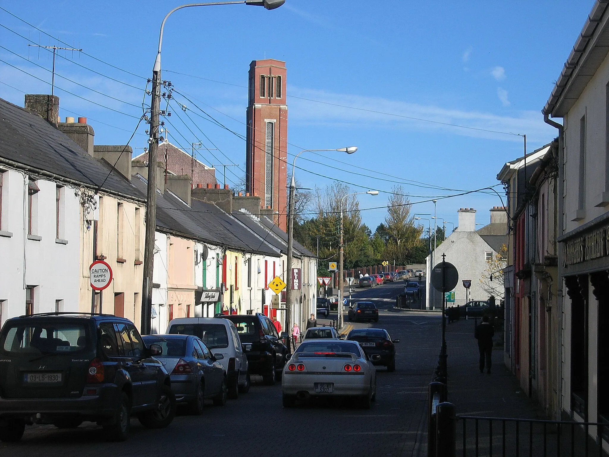 Photo showing: Bridge Street in Portlaoise, looking east with the Roman Catholic Parish Church of SS. Peter and Paul in the background.