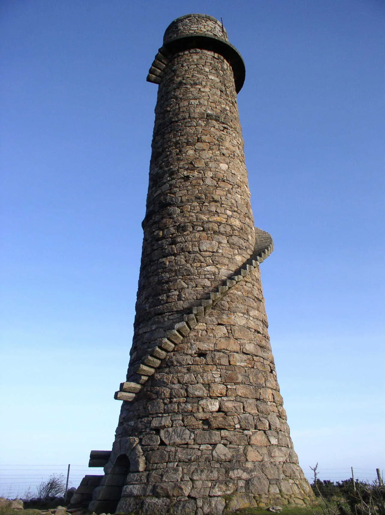 Photo showing: Lead Mines Chimney near Kiltiernan. Chimney at disused lead mines near Kiltiernan, South Co. Dublin. A well-known local land mark.