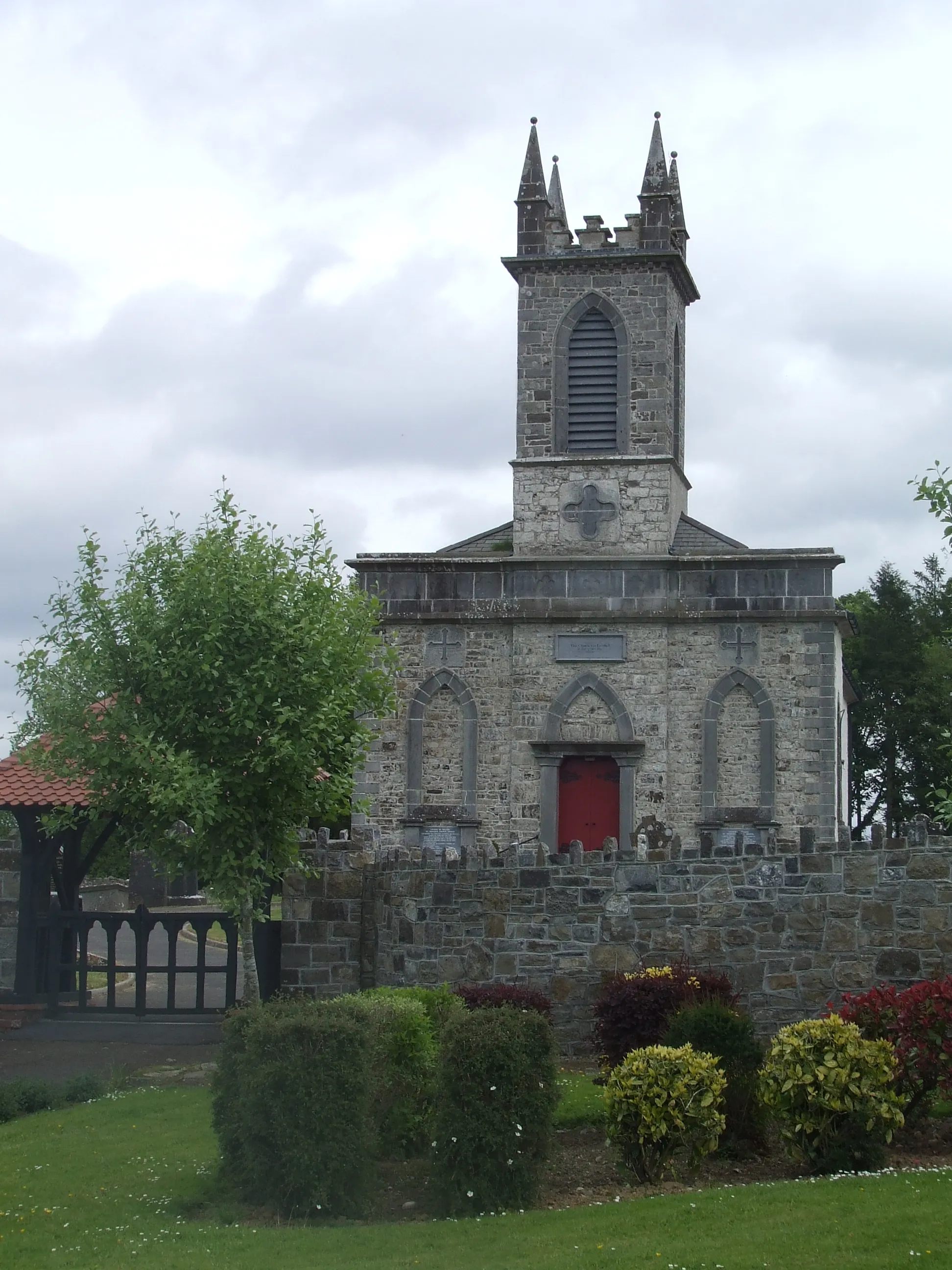 Photo showing: Western elevation and lychgate of the church of St Patrick (Church of Ireland) in the village of Ardagh, County Longford