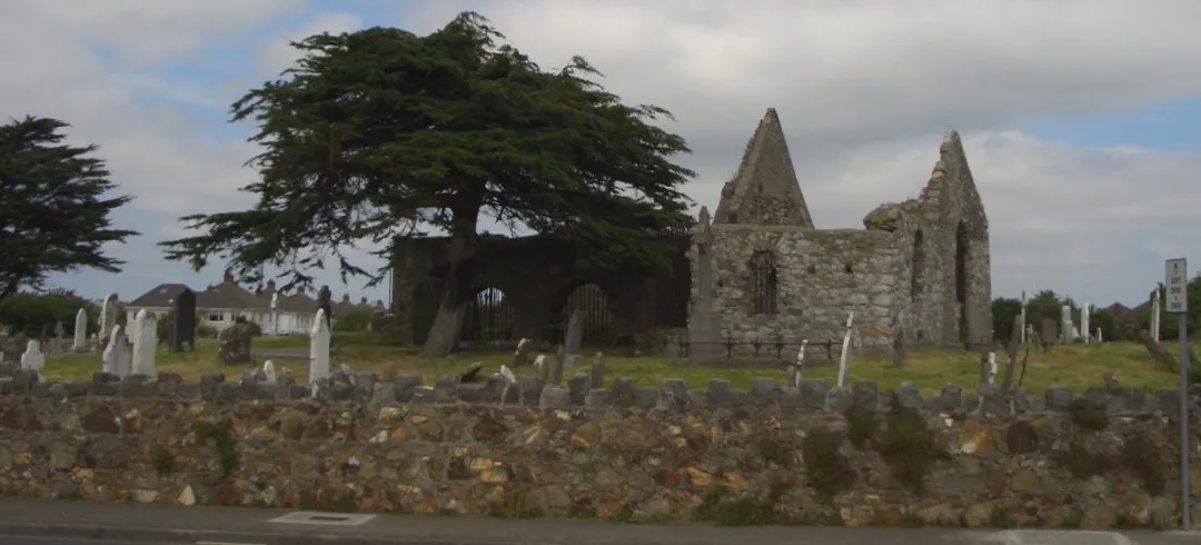 Photo showing: Kilbarrack Church (formerly the Chapel of Mone) and Graveyard, on the coast road in the townland of Kilbarrack, County Dublin. Now lies in the new district of Bayside, developed in the 1970s on the site of Kilbarrack hamlet.  Larger version.