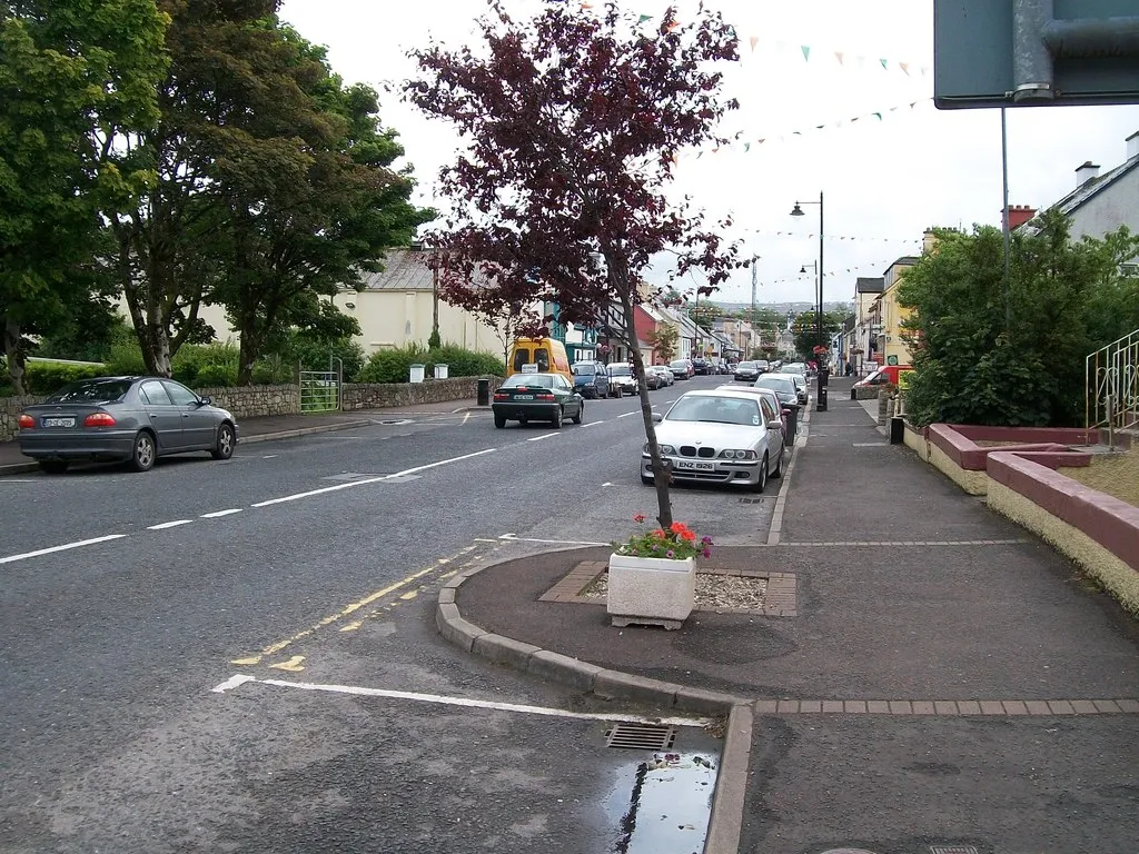 Photo showing: View south-eastwards along the upper section of Glenties' Main Street