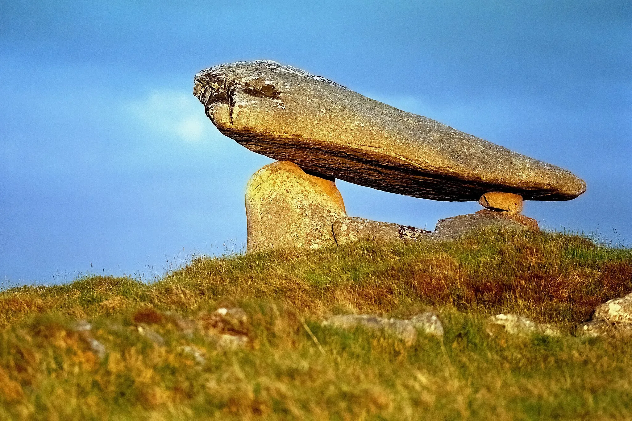 Photo showing: The Kilclooney Dolmen near Ardara, County Donegal, Republic of Ireland, pictured on a sunny evening in June 1986.
