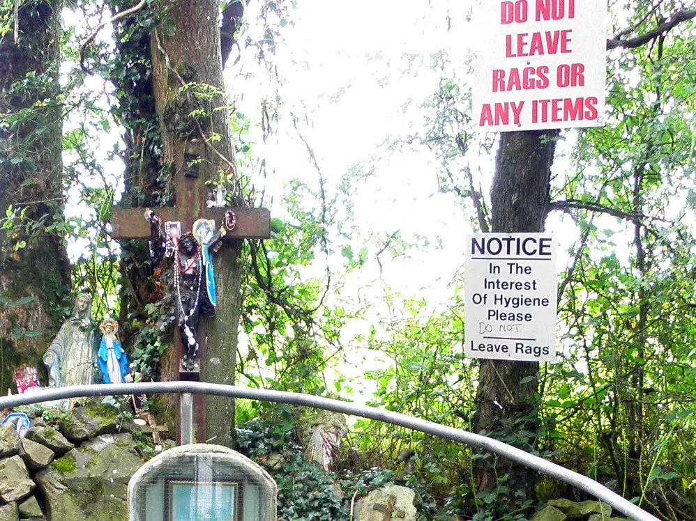 Photo showing: "Do not leave rags" notices, St Malachy's Well