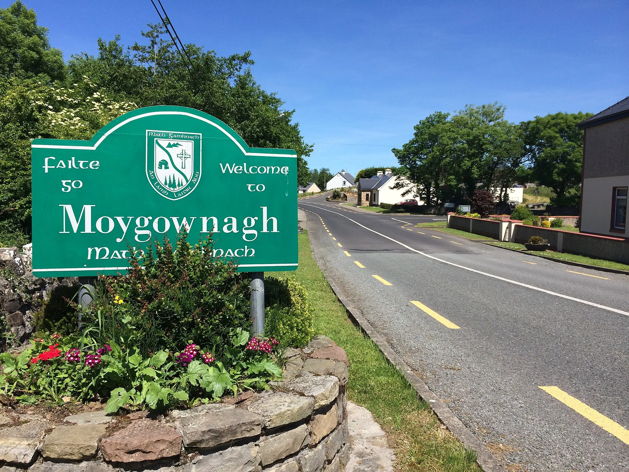 Photo showing: Sign on entrance to Moygownagh Village