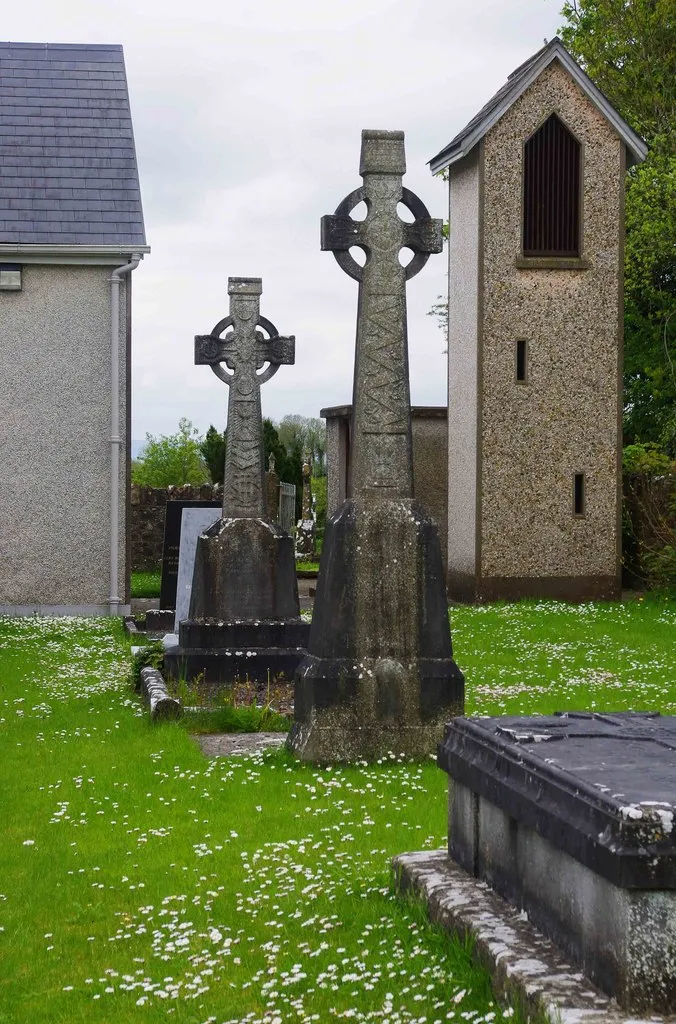 Photo showing: Two Celtic cross tombs, churchyard of St. Molua's Church, Main Street, Ardagh, Co. Limerick