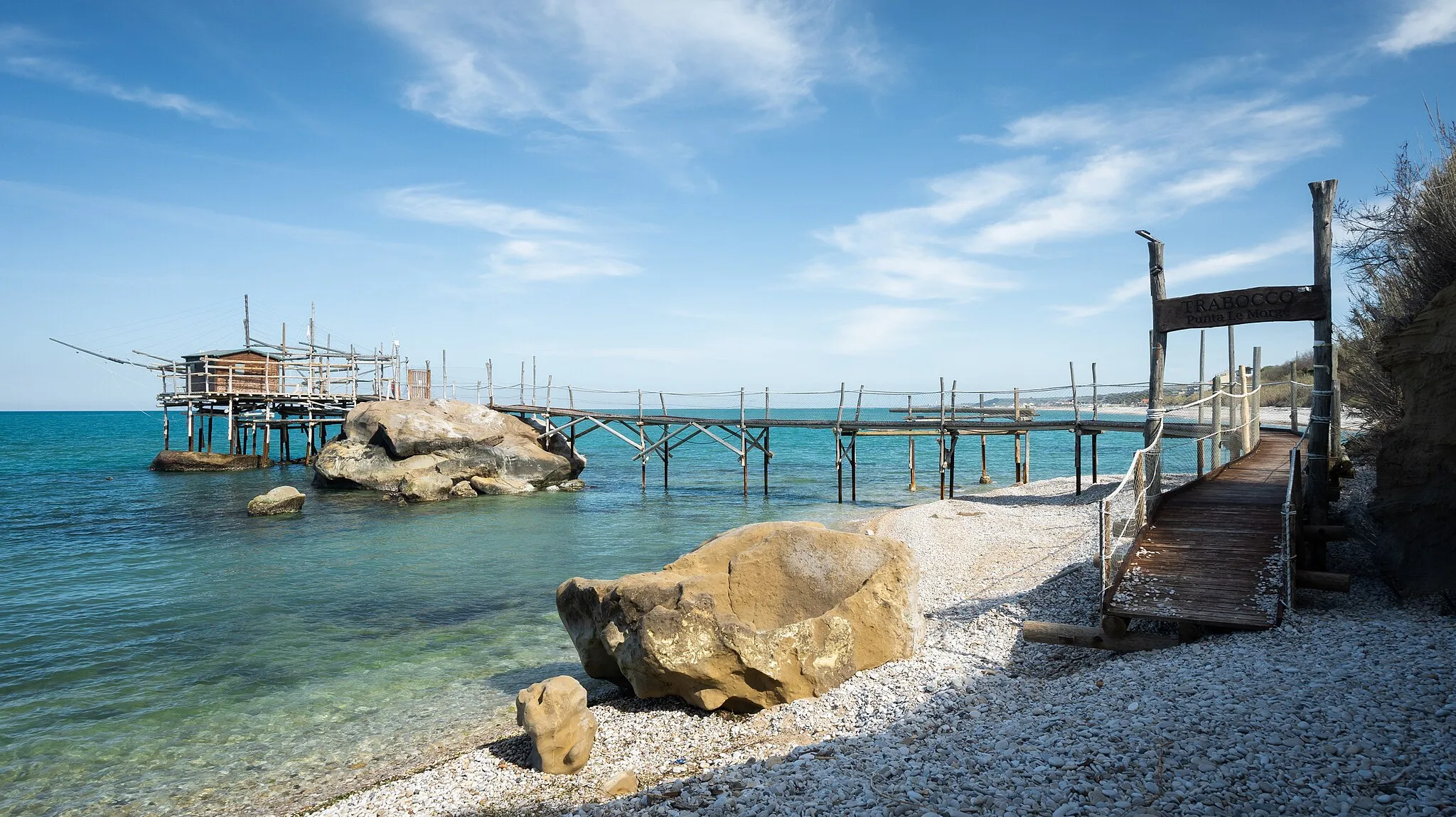 Photo showing: There's quite a few of these piers with houses in this region.