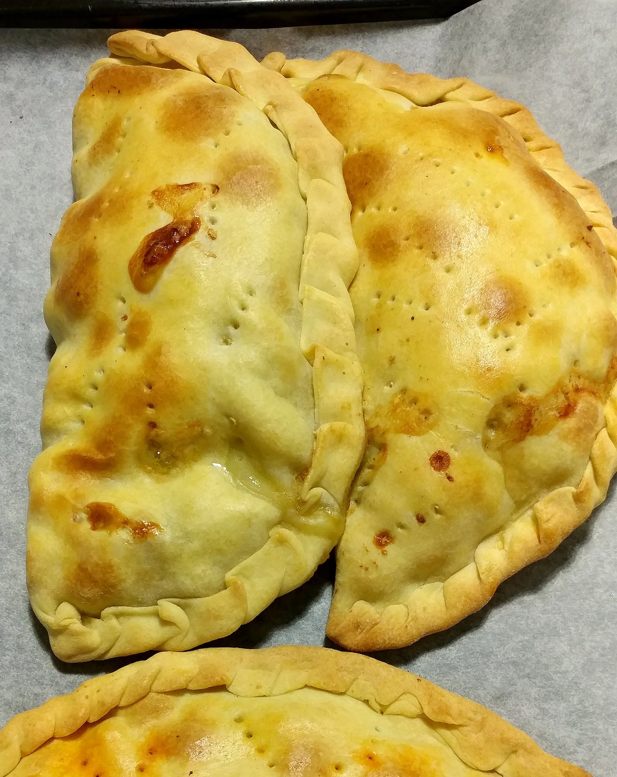 Photo showing: half moon shaped baked good filled with minced meat from Rotondella, Italy