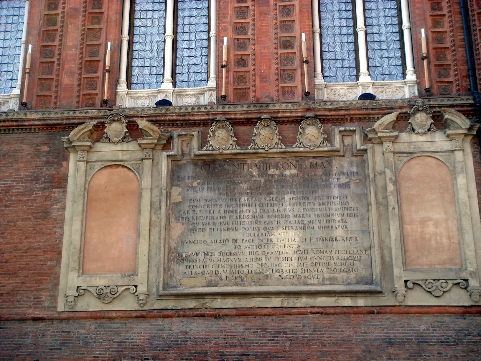 Photo showing: 1598 plaque, honouring pope (as well as souverain of Bologna) Clemens VIII, along the facade of the Palazzo Comunale in Piazza Maggiore square in Bologna, Italy. Picture by Giovanni Dall'Orto, February 9 2008.