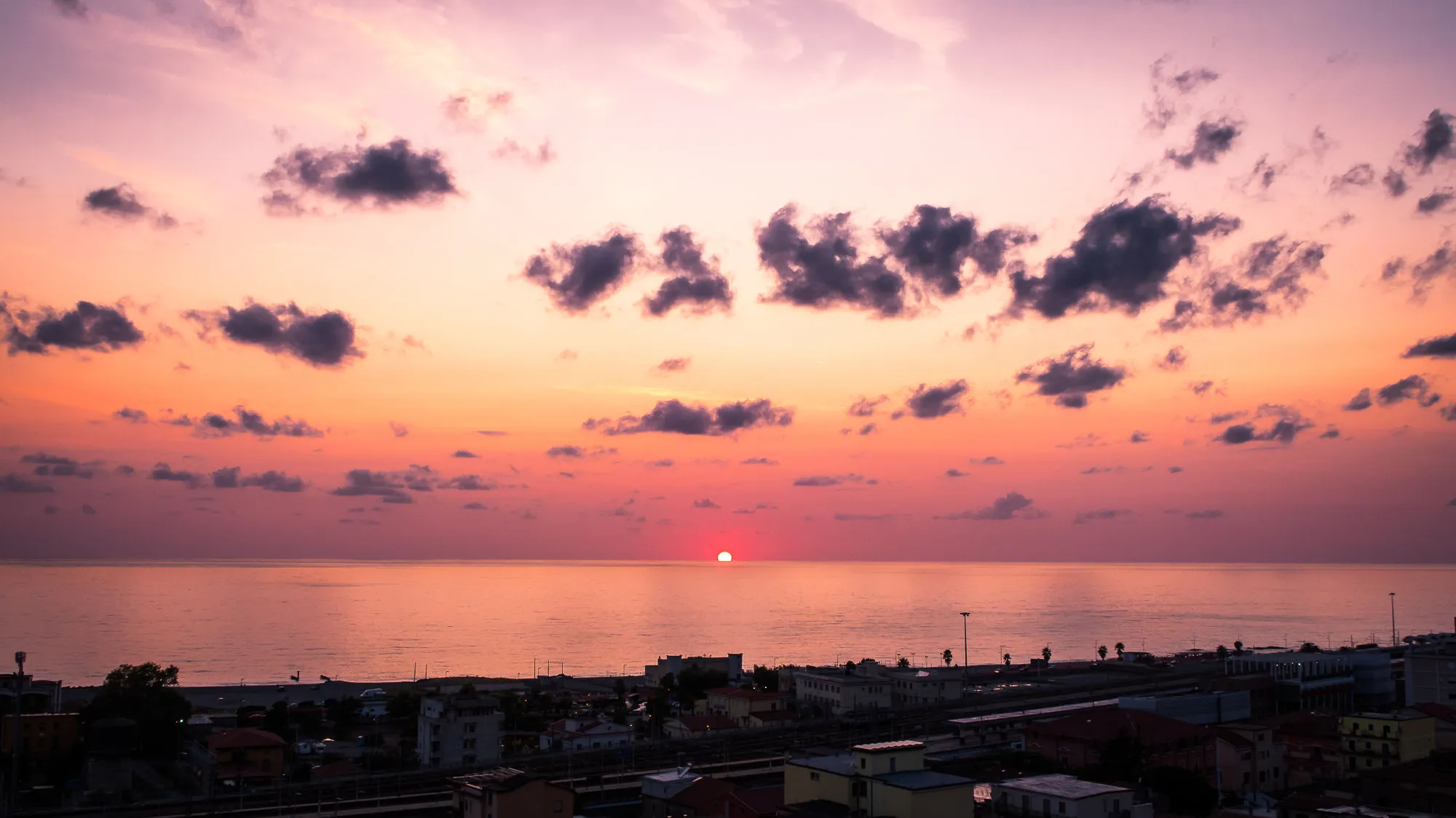 Photo showing: 500px provided description: Check out my gallery at www.pixael.com/en/pictures if you want to see more pictures.
You can follow me on
www.facebook.com/giuseppemilophoto
twitter.com/pixael_com

instagram.com/pixael/ [#yellow ,#sky ,#landscape ,#city ,#sea ,#sunset ,#water ,#reflection ,#clouds ,#italy ,#cityscape ,#orange ,#pink ,#seascape ,#italia ,#paola]