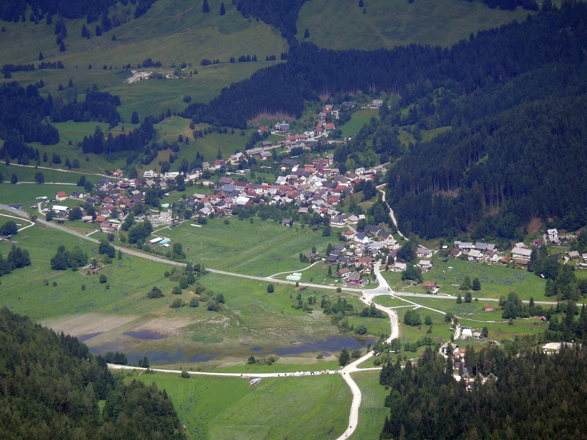 Photo showing: View of Rateče, a settlement in the Upper Sava Valley, from Mt. Ciprnik (Julian Alps).