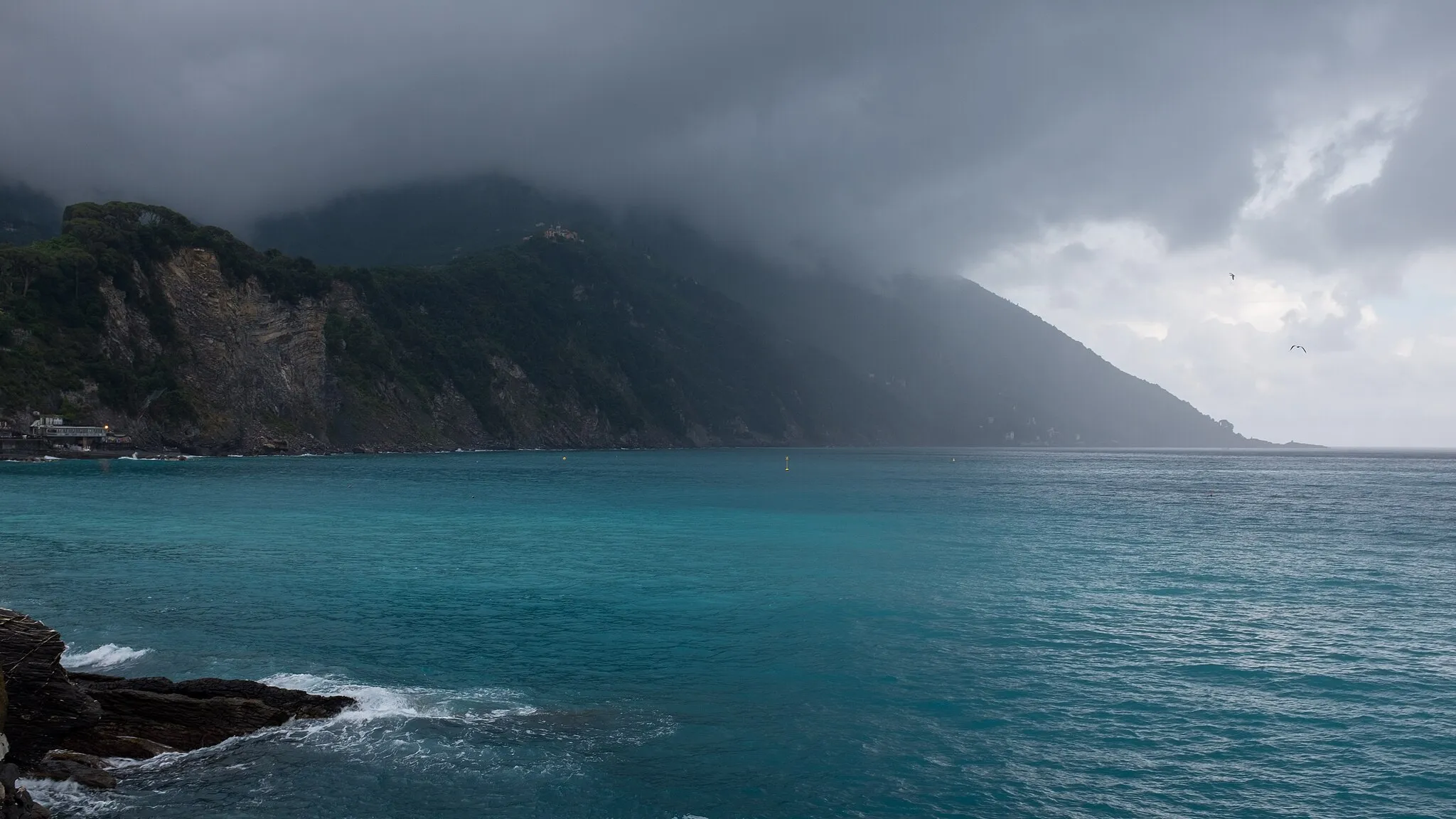 Photo showing: View of Portofino Natural Park from Camogli while raining.