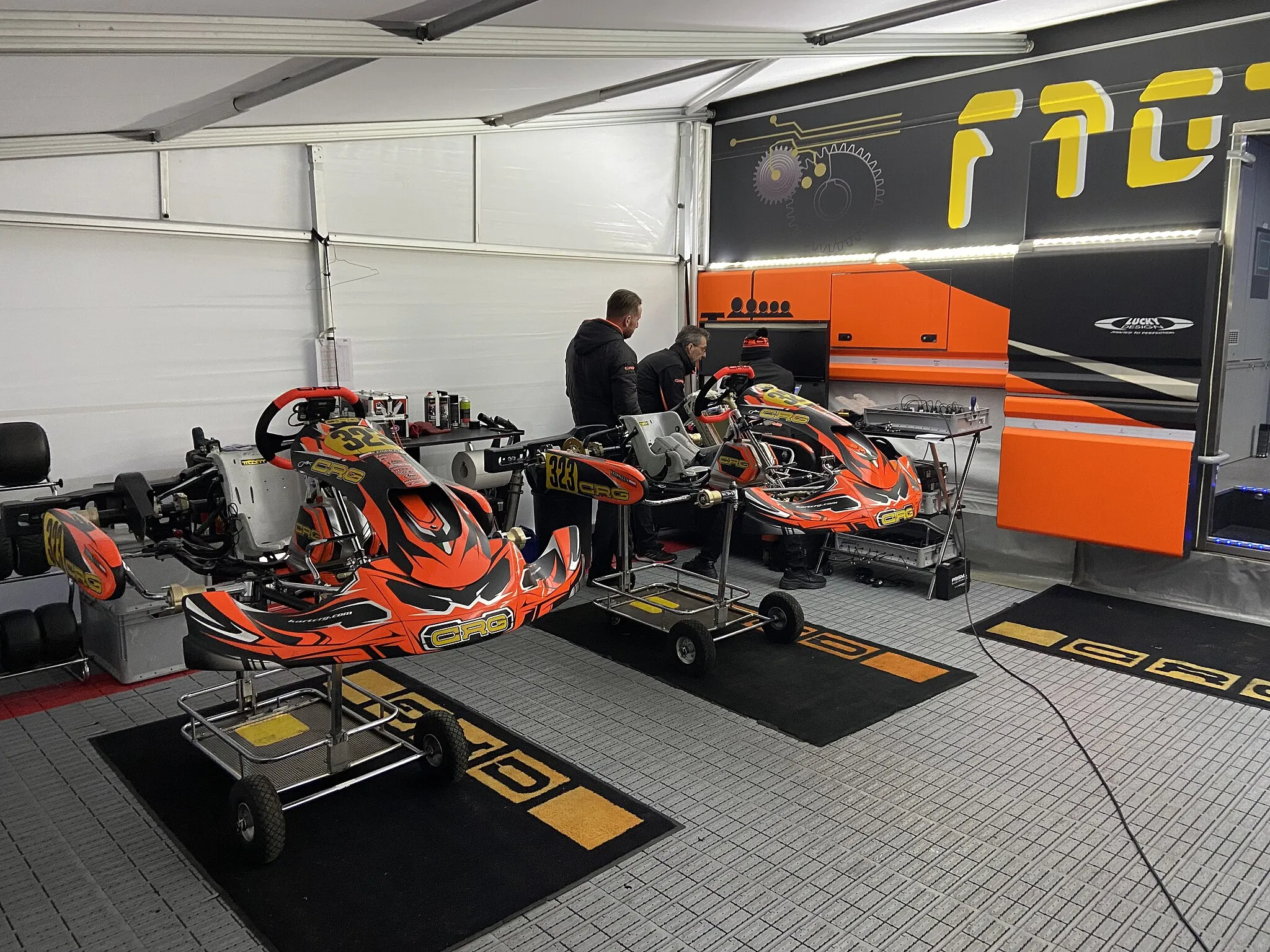 Photo showing: Klara Kowalczyk's karts under CRG Factory Karting Racing Team's tent